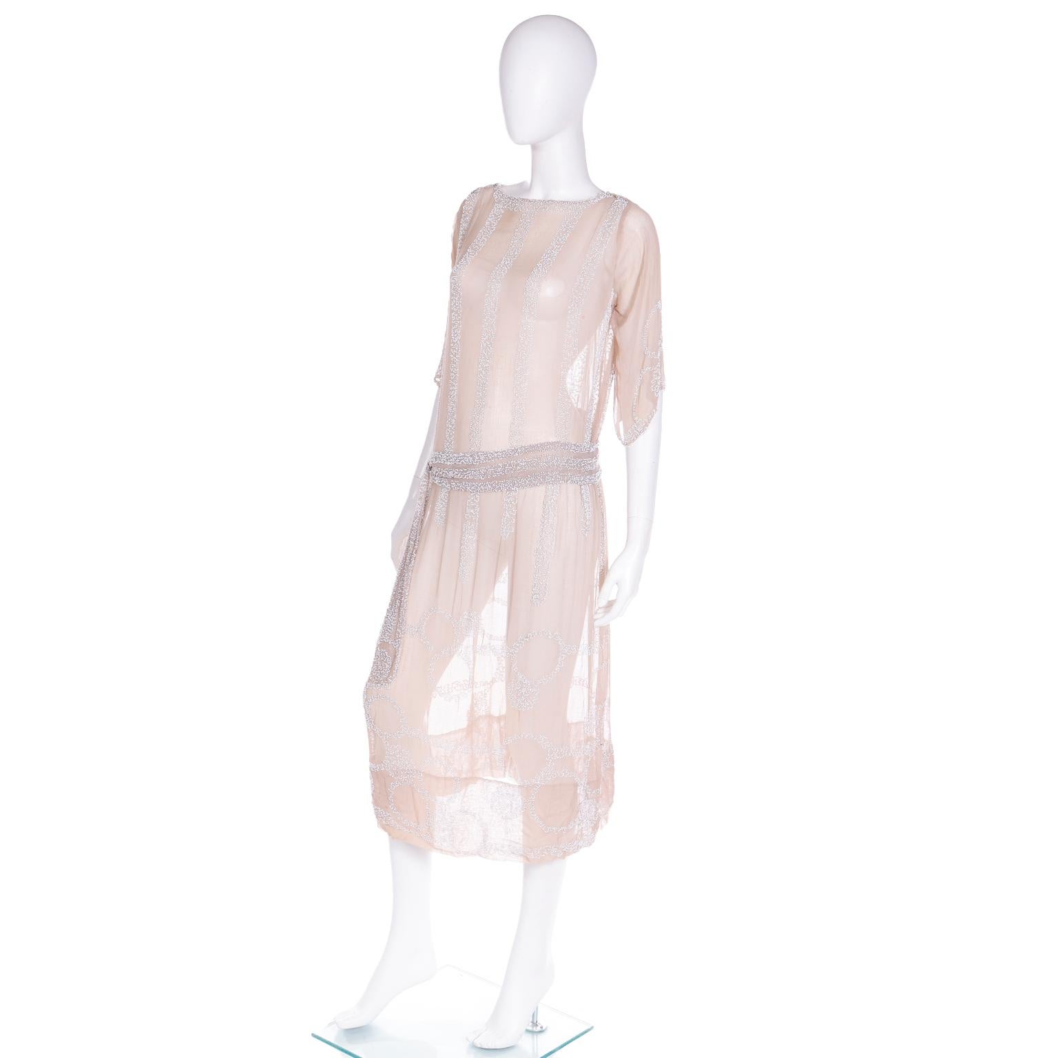 1920s French Beaded Sand Nude Silk Flapper Dress with Attached Fabric Belt For Sale 1