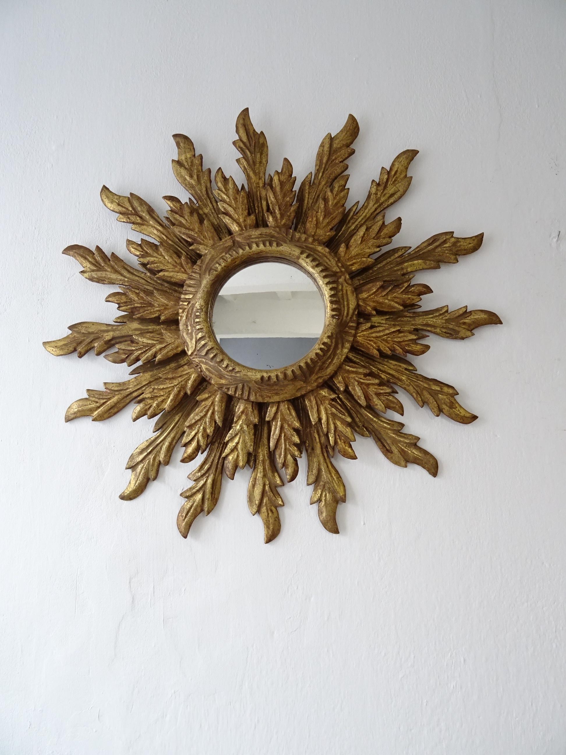 Beautiful big French wood gold starburst. Amazing patina. Double wood with mirror in perfect shape. Mirror itself measures 6 inches round. Free priority UPS shipping from Italy, no custom fees.