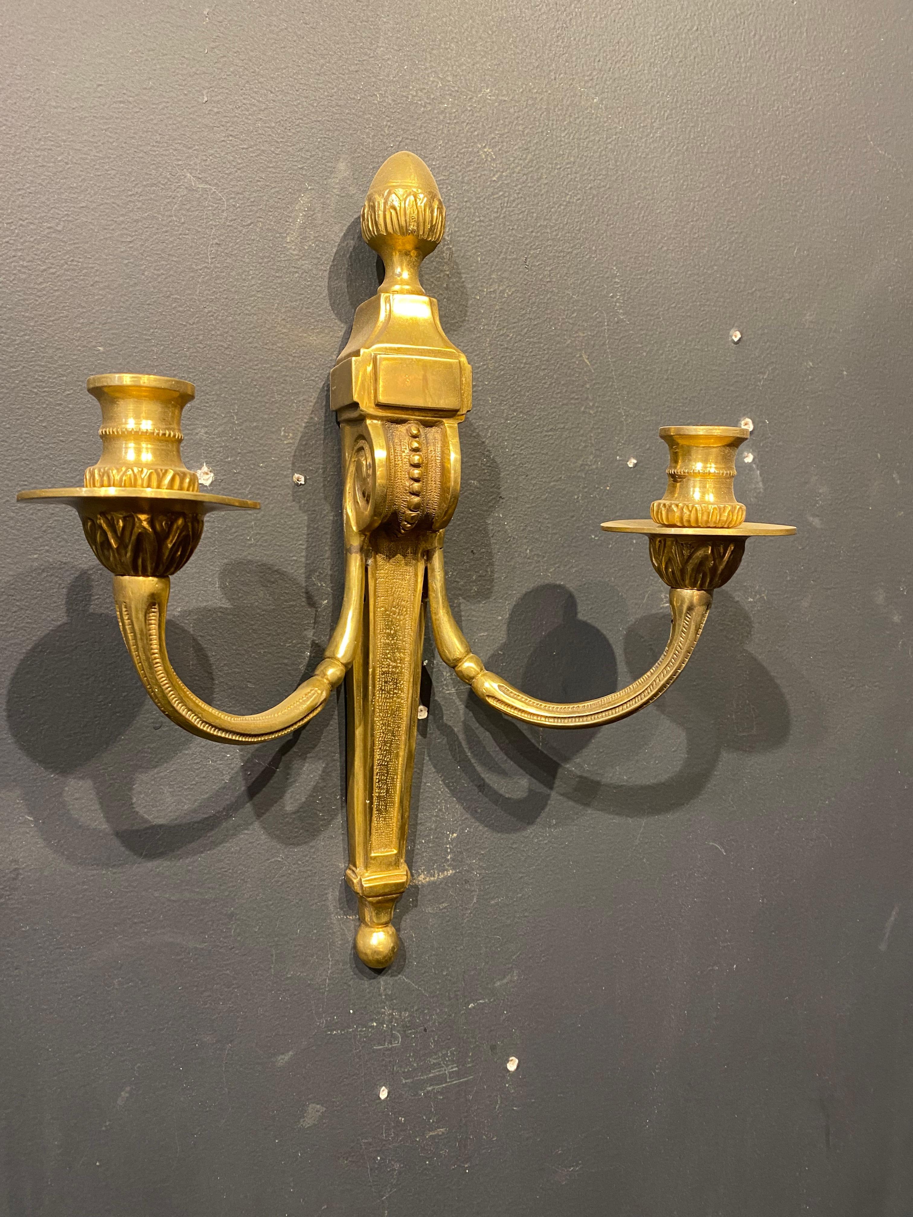 A circa 1920's French bronze sconces with two lights.