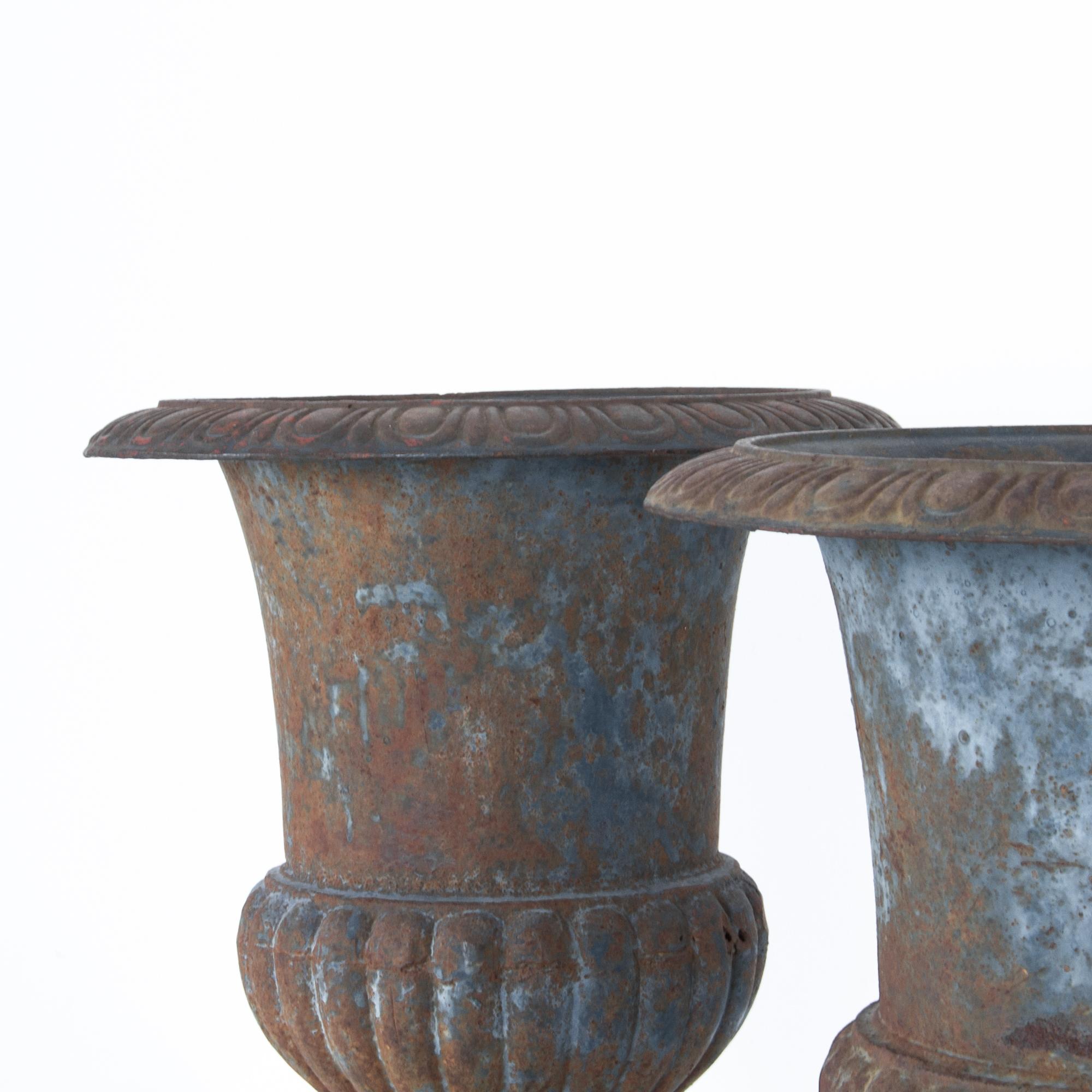 Early 20th Century 1920s French Cast Iron Urns, a Pair