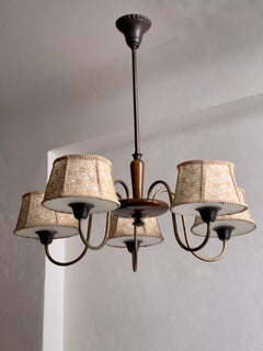 1920s French Chandelier in lacquered wood, bronze, brass and frosted glass.