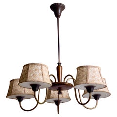 1920s French Chandelier in lacquered wood, bronze, brass and frosted glass.