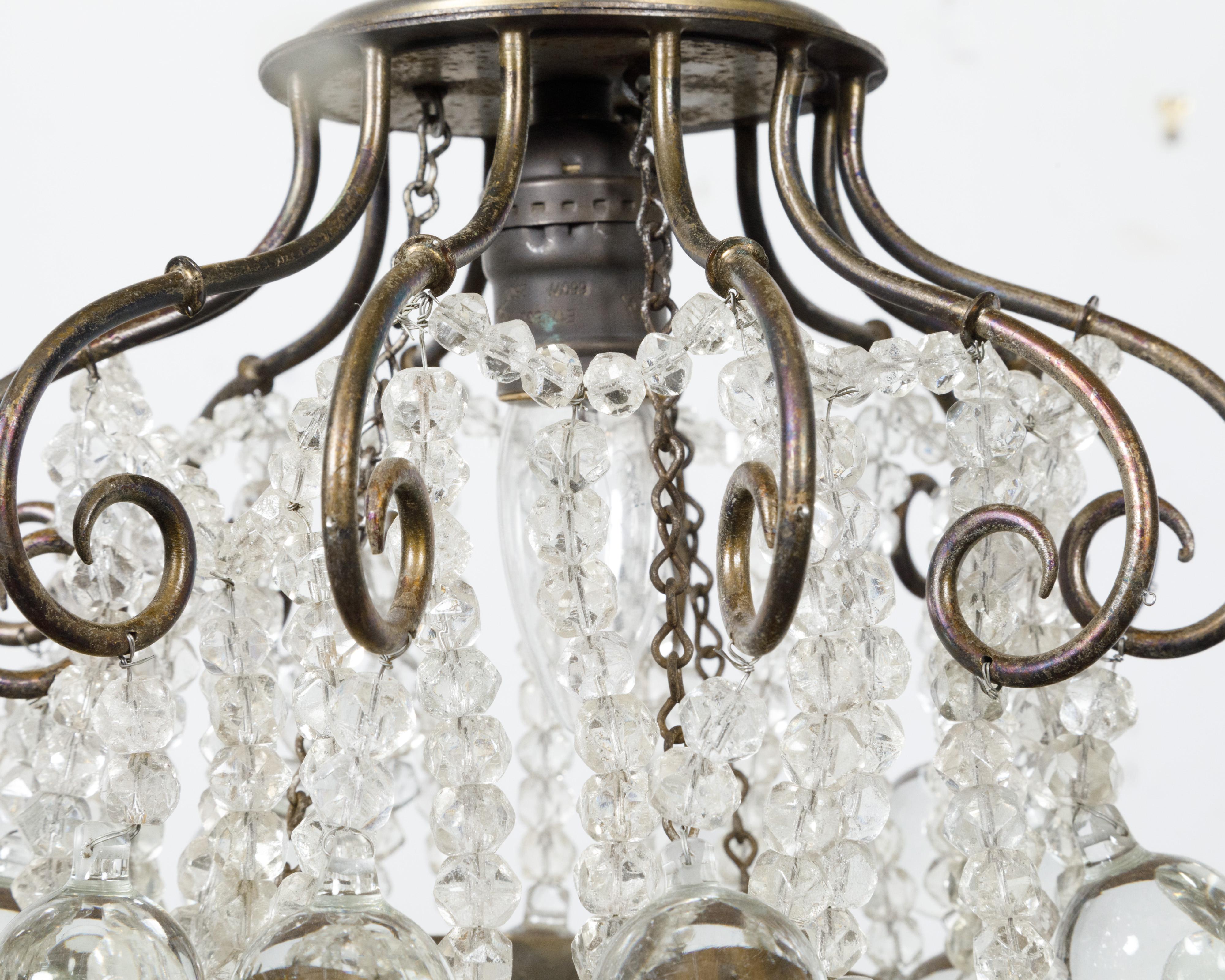 20th Century 1920s French Crystal Chandelier with Cascading Effects and Scrolls, USA Wired For Sale