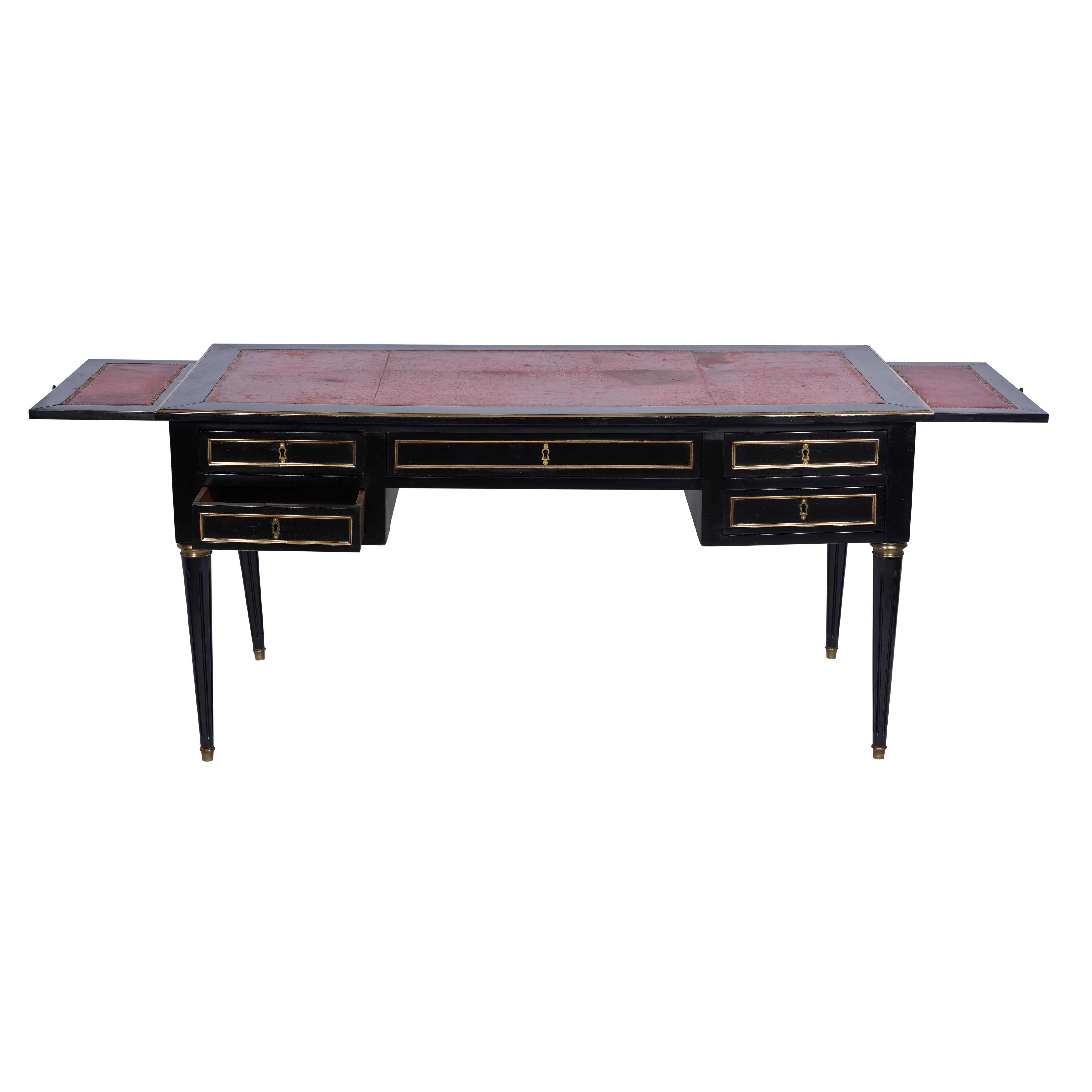 This black ebonized directoire style desk includes brass detailing, red leather and original keys. France, circa 1920-1930.

Since Schumacher was founded in 1889, our family-owned company has been synonymous with style, taste, and innovation. A