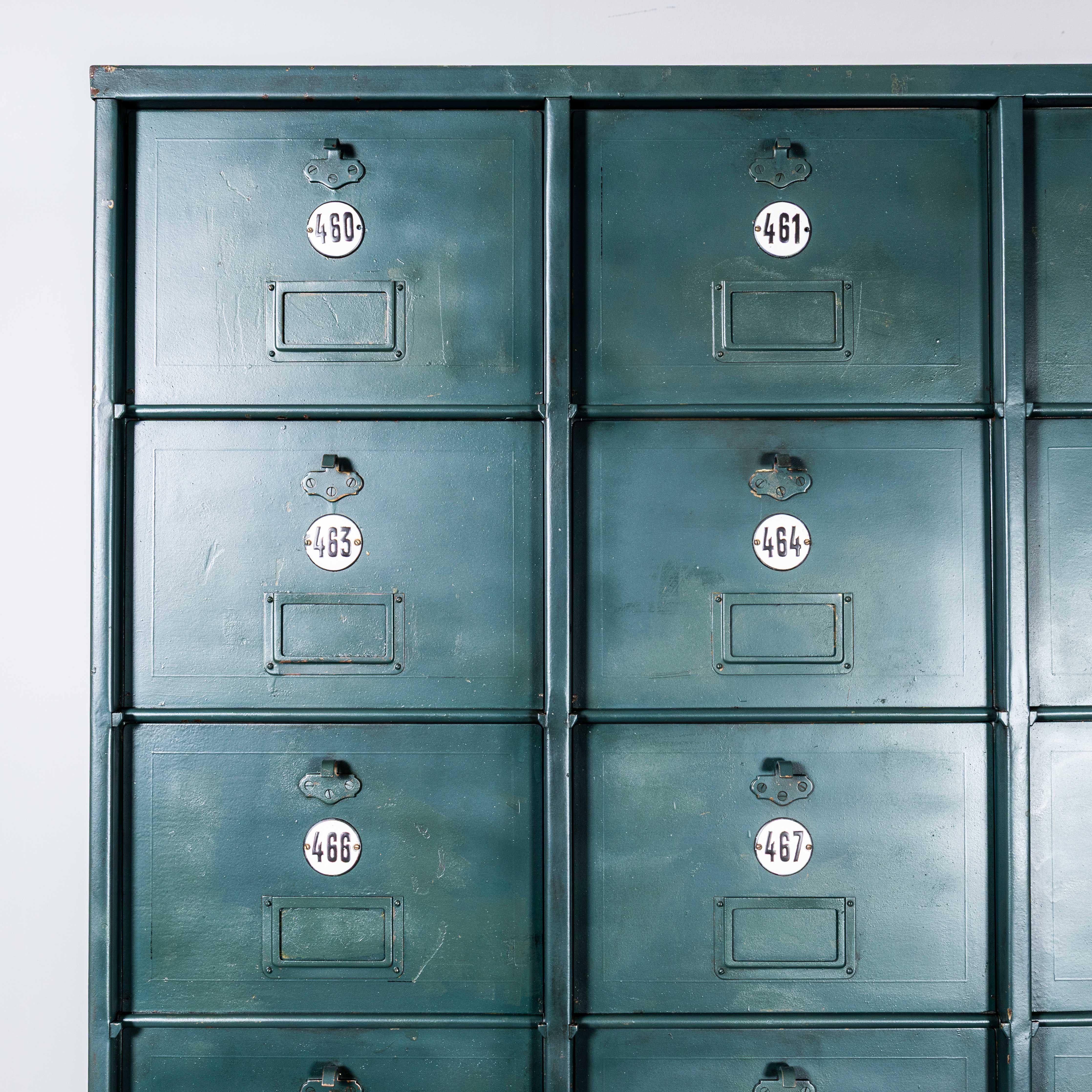 1920’s French Industrial Metal Cabinet Dark Green – Twenty Seven Klappets. 

Beautifully made very heavy weight sheet metal filing cabinet, with thirty six hinged ‘klappet’ compartments. The compartments are the perfect size for letters and small