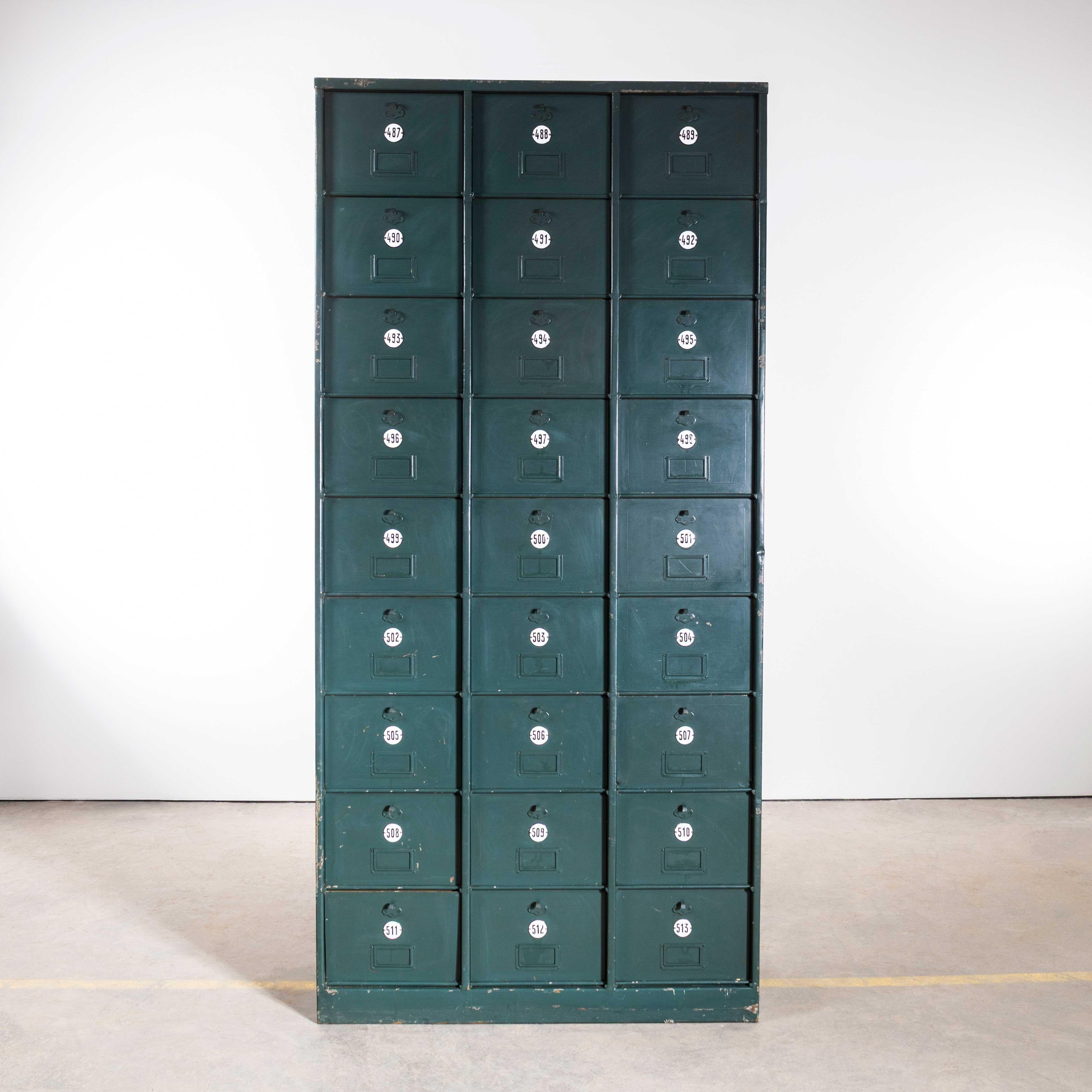 1920’s French Industrial Metal Cabinet Dark Green – Twenty Seven Klappets. 

Beautifully made very heavy weight sheet metal filing cabinet, with twenty seven hinged ‘klappet’ compartments. The compartments are the perfect size for A4 documents
