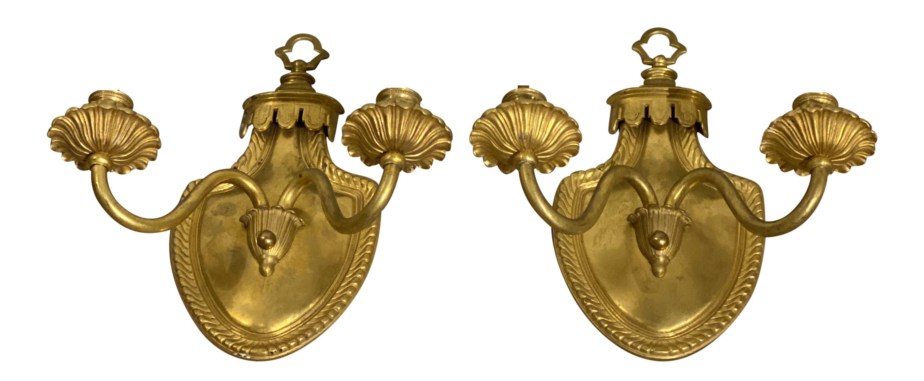 A pair of circa 1920’s French gilt bronze sconces in original finish 