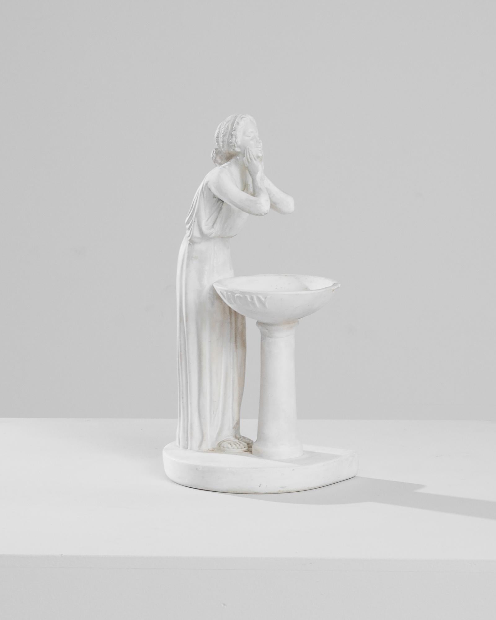 Entrez dans l'élégance des années folles avec ce buste de femme en marbre français des années 1920, une pièce qui rappelle la célèbre œuvre 