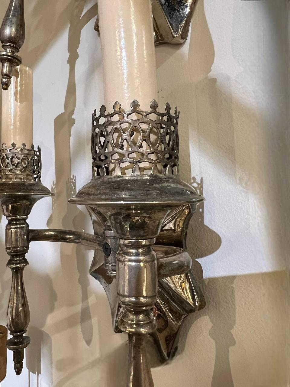 A circa 1920's French silver plated sconces with unusual two arms 