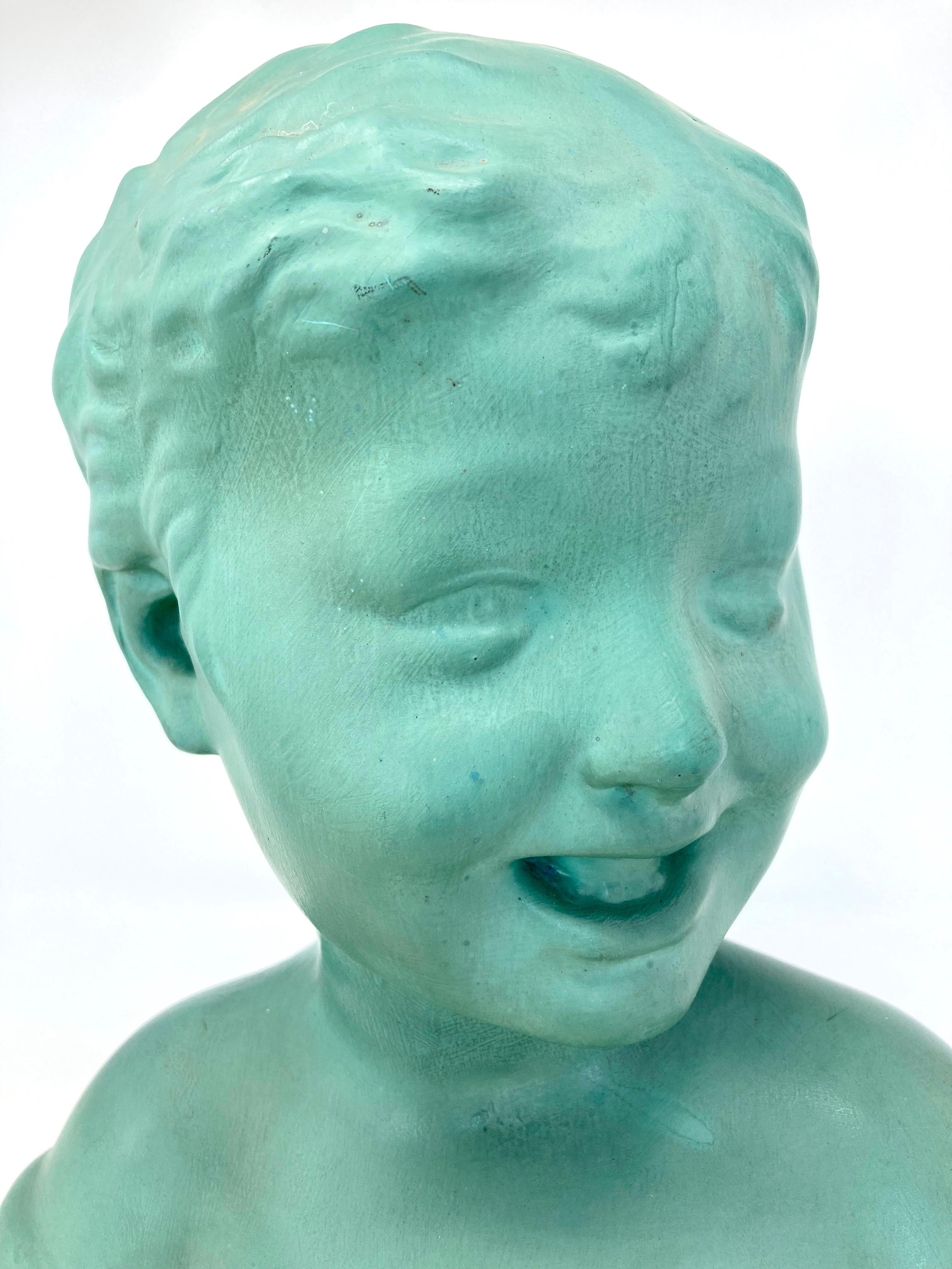 Buste en terre cuite française des années 1920 par Saint Clément Copie de l'enfant rieur de Settignanos  Bon état - En vente à COLMAR, FR