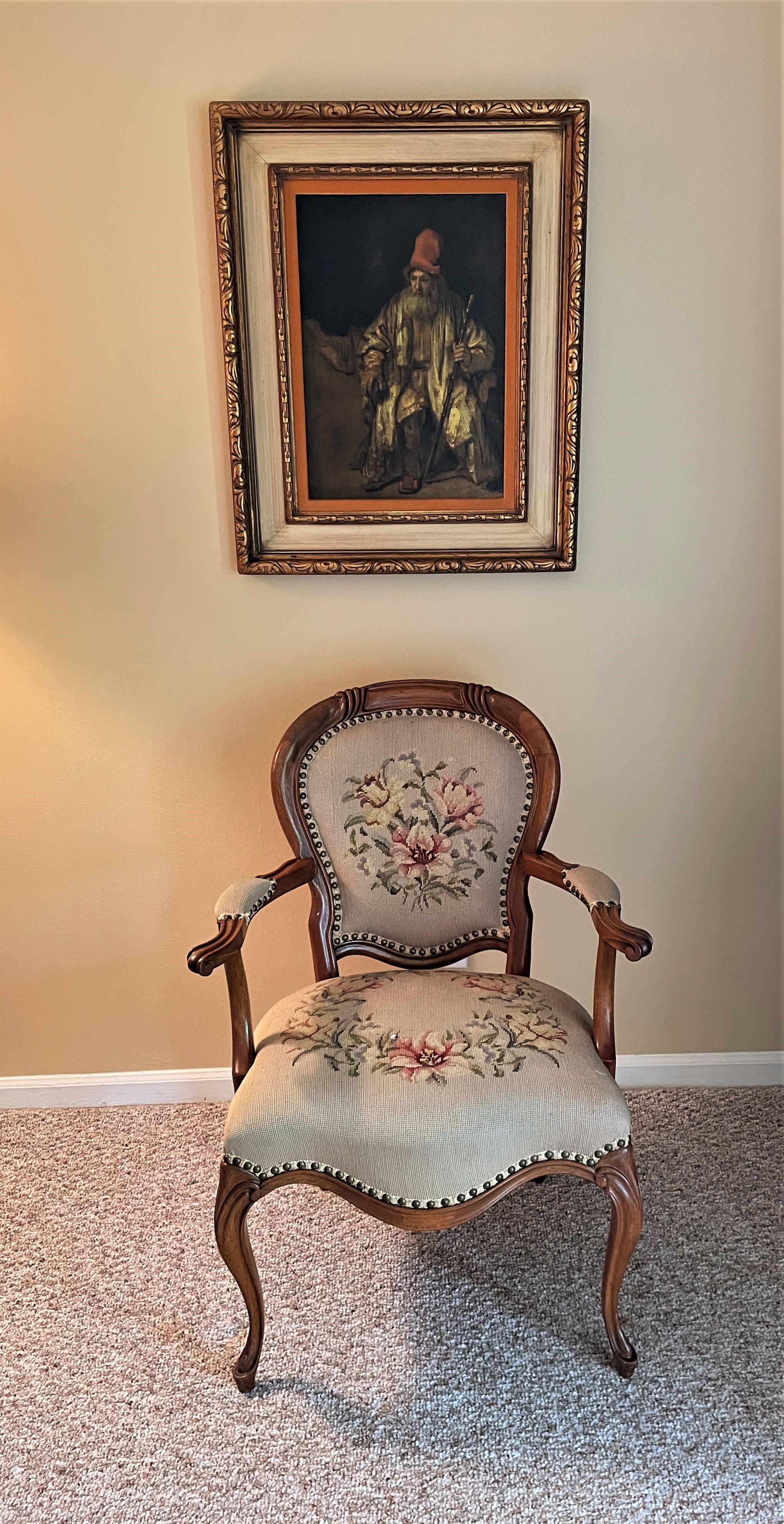 This solid walnut accent chair is a hand-carved French piece that dates to the 1920s. This piece could just as easily be found in an elegant Montecito home today with its neutral palette, warm walnut frame and classic French lines. In fact, it has a