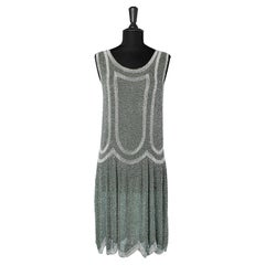 1920's full beaded dress on pale green cotton base 