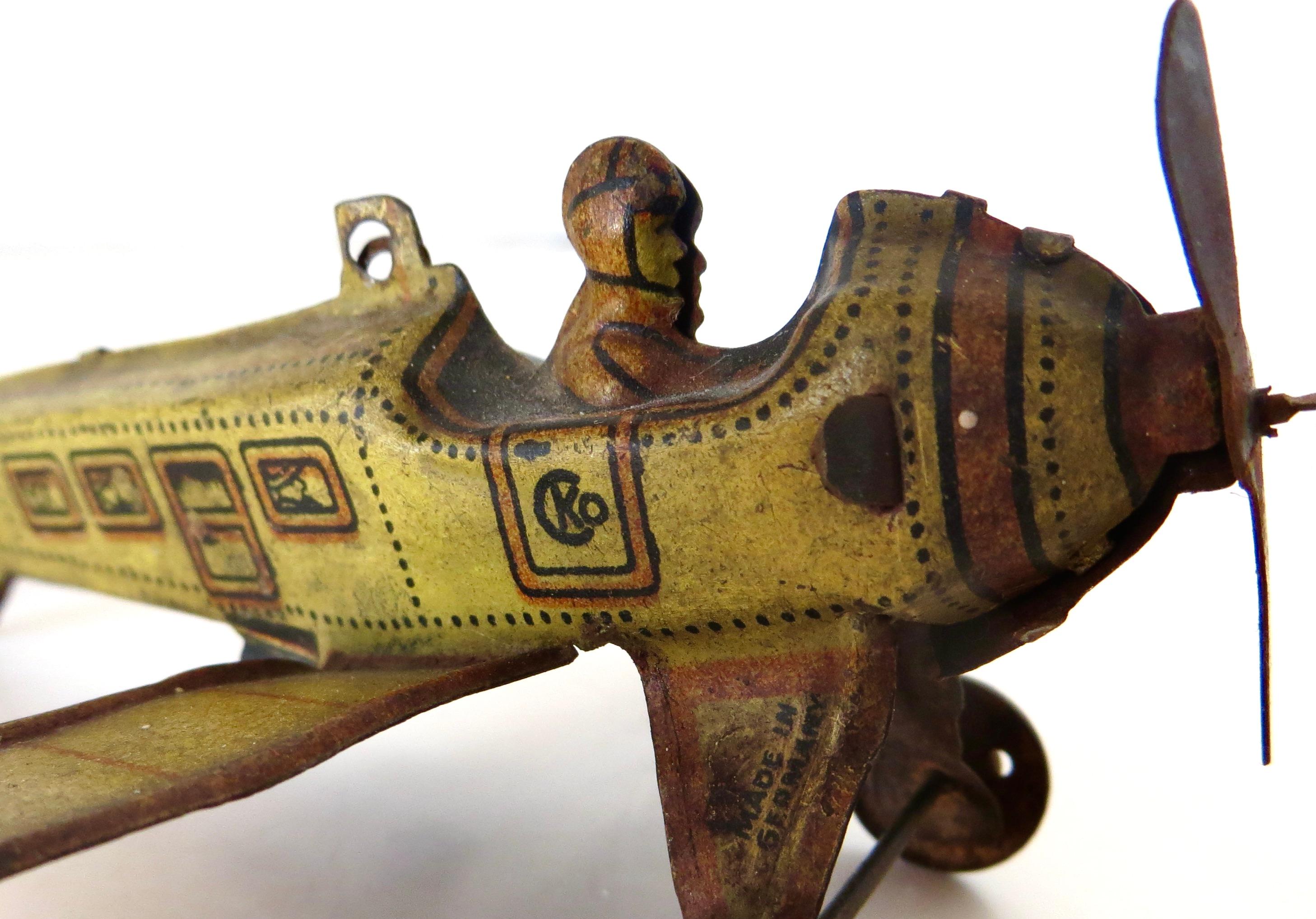 Tin 1920's German Airplane Penny Toy by Kellerman (Mounted on Marx 