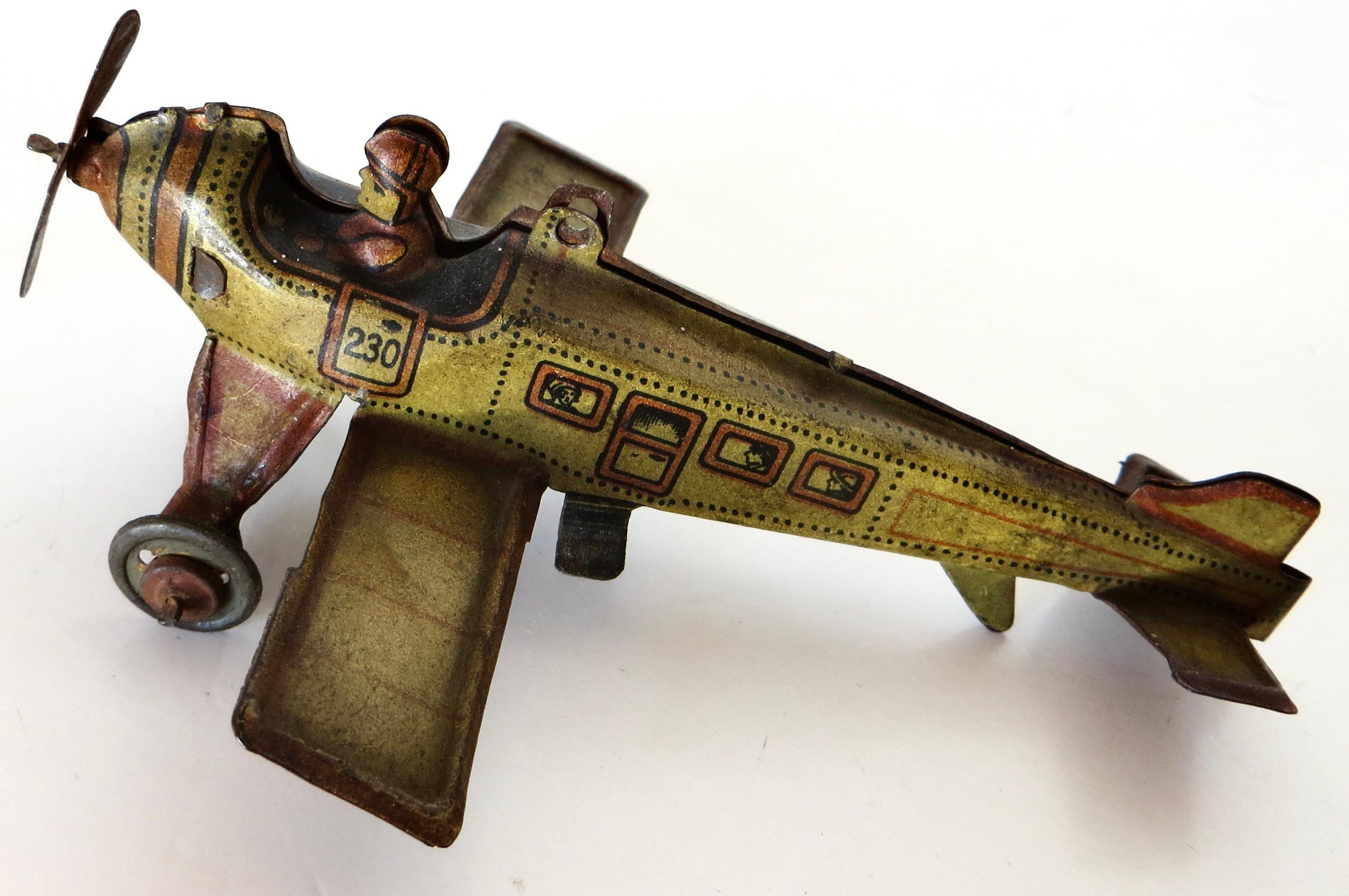 1920's German Airplane Penny Toy by Kellerman (Mounted on Marx 
