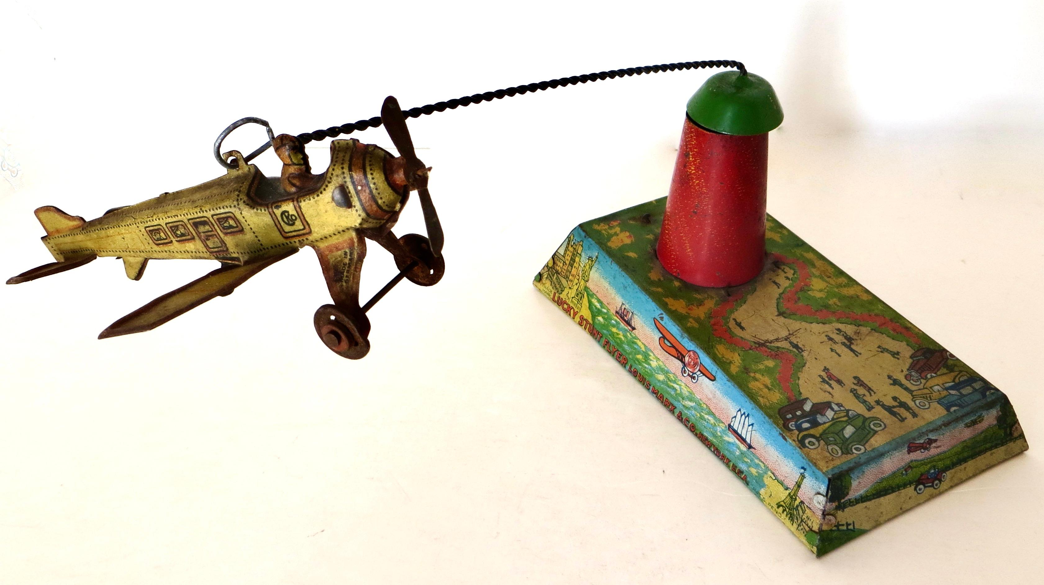 1920's German Airplane Penny Toy by Kellerman (Mounted on Marx 
