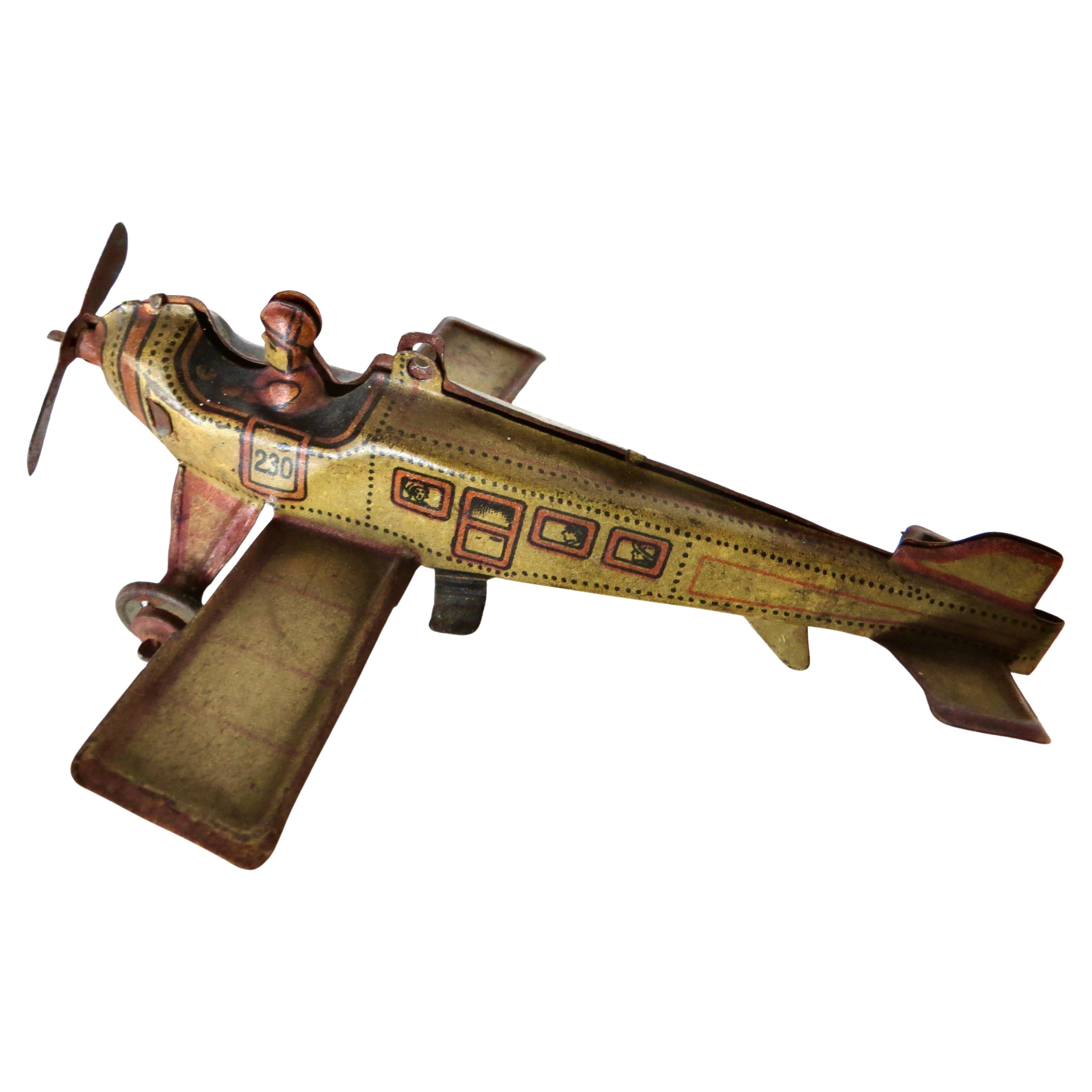 1920's German Airplane Penny Toy by Kellerman (Mounted on Marx "Lucky Stunt")