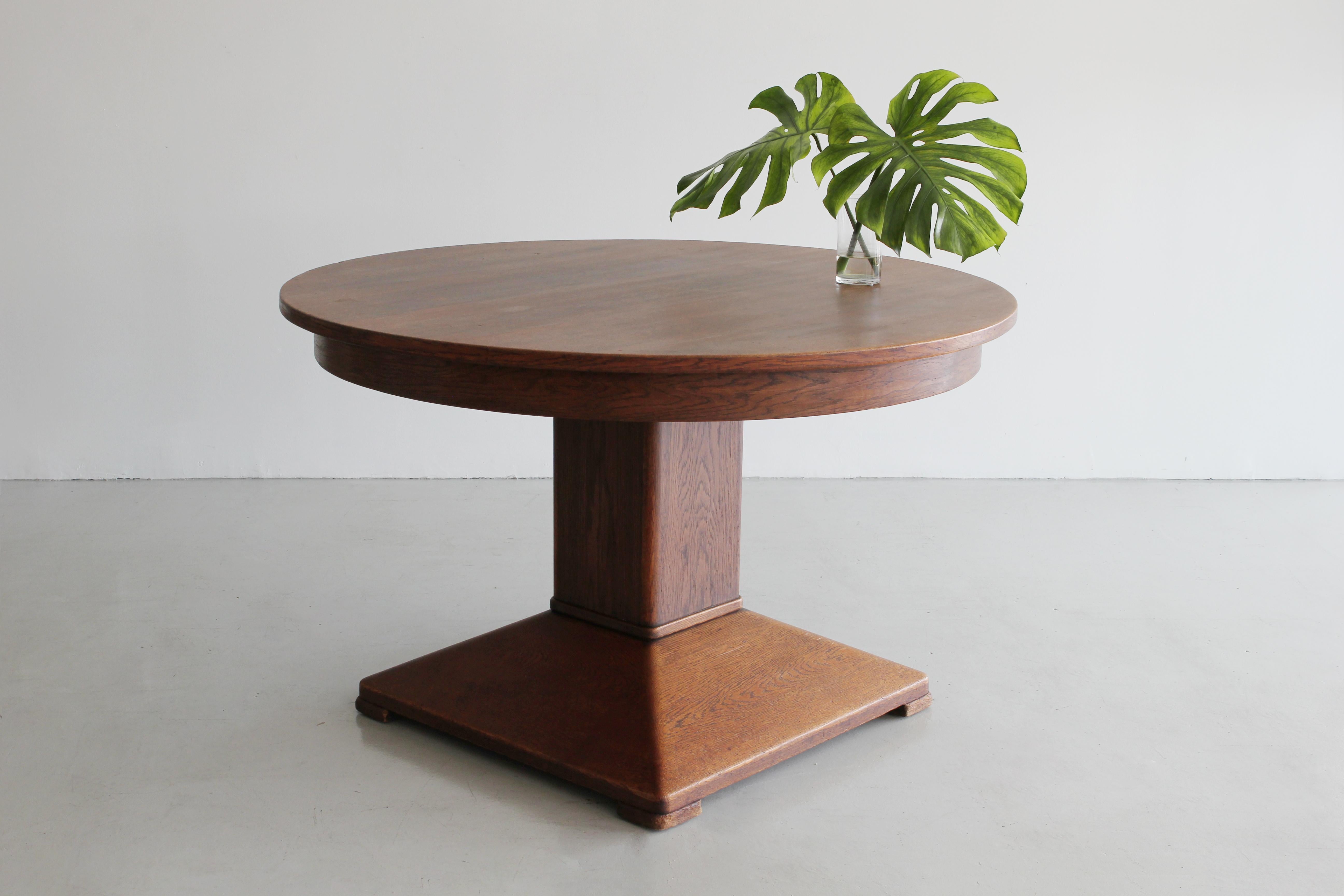 1920s German oak table with pedestal base and beautiful original patina.