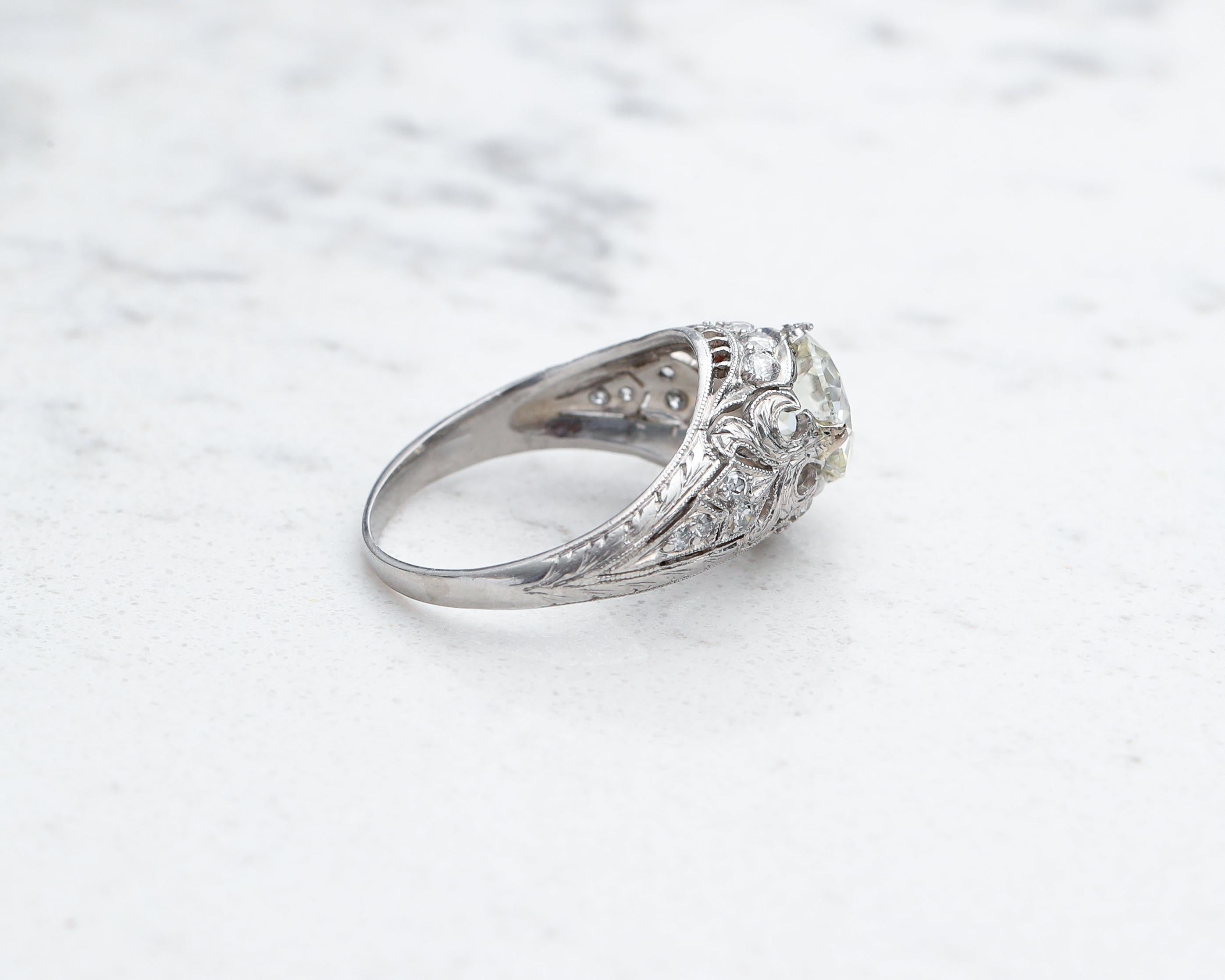 1920s GIA Certified 1.90 Carat Total Diamond Platinum Engagement Ring In Excellent Condition In Atlanta, GA
