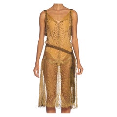 Abito da cocktail Flapper 1920S in pizzo di seta dorata con cintura con nappe