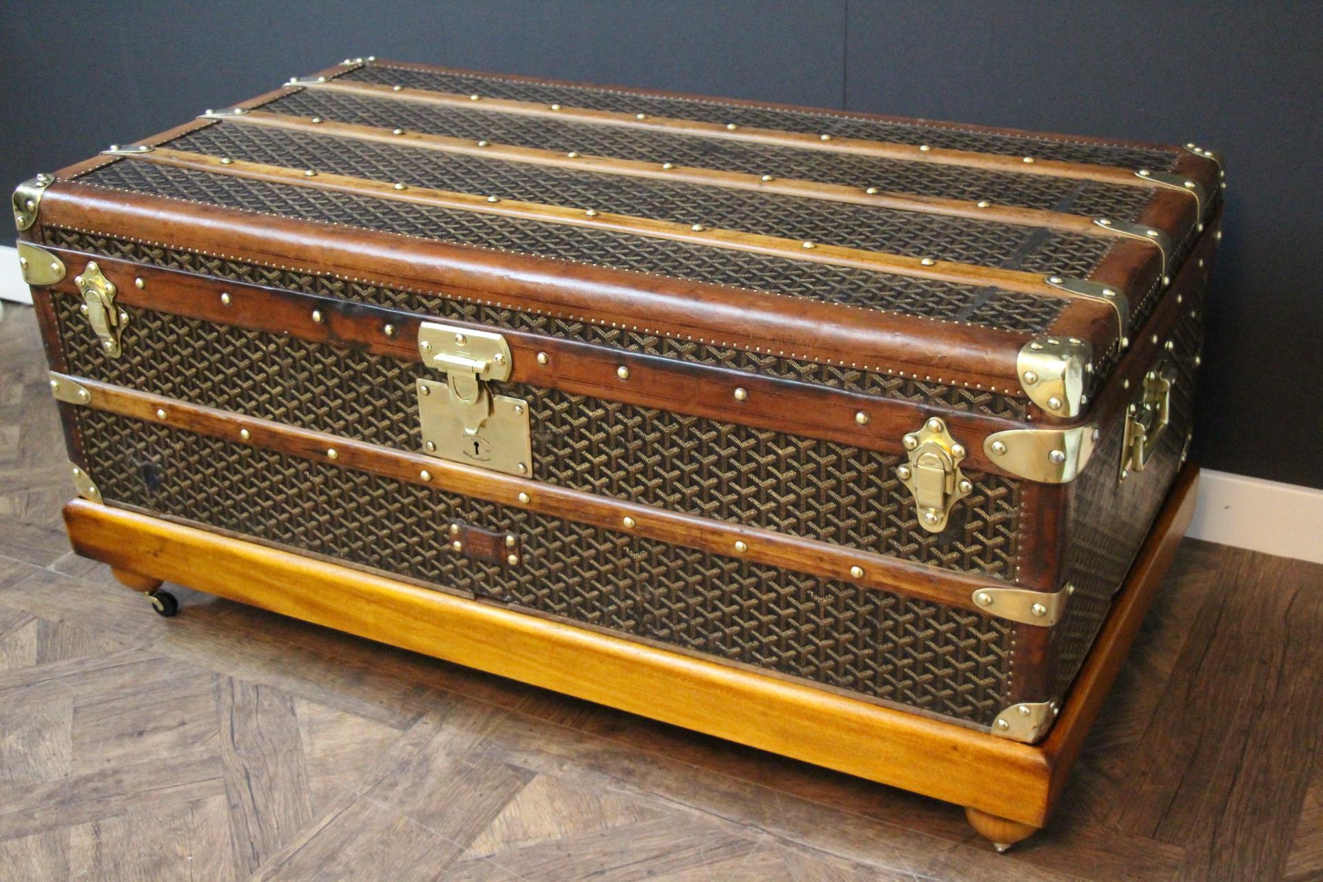 This superb Goyard steamer trunk features the very sought after chevrons canvas as well as all solid brass fittings: Goyard marked side handles and locks. Brass studs. This trunk has many wood slats as well as all chocolate color leather trims.It is