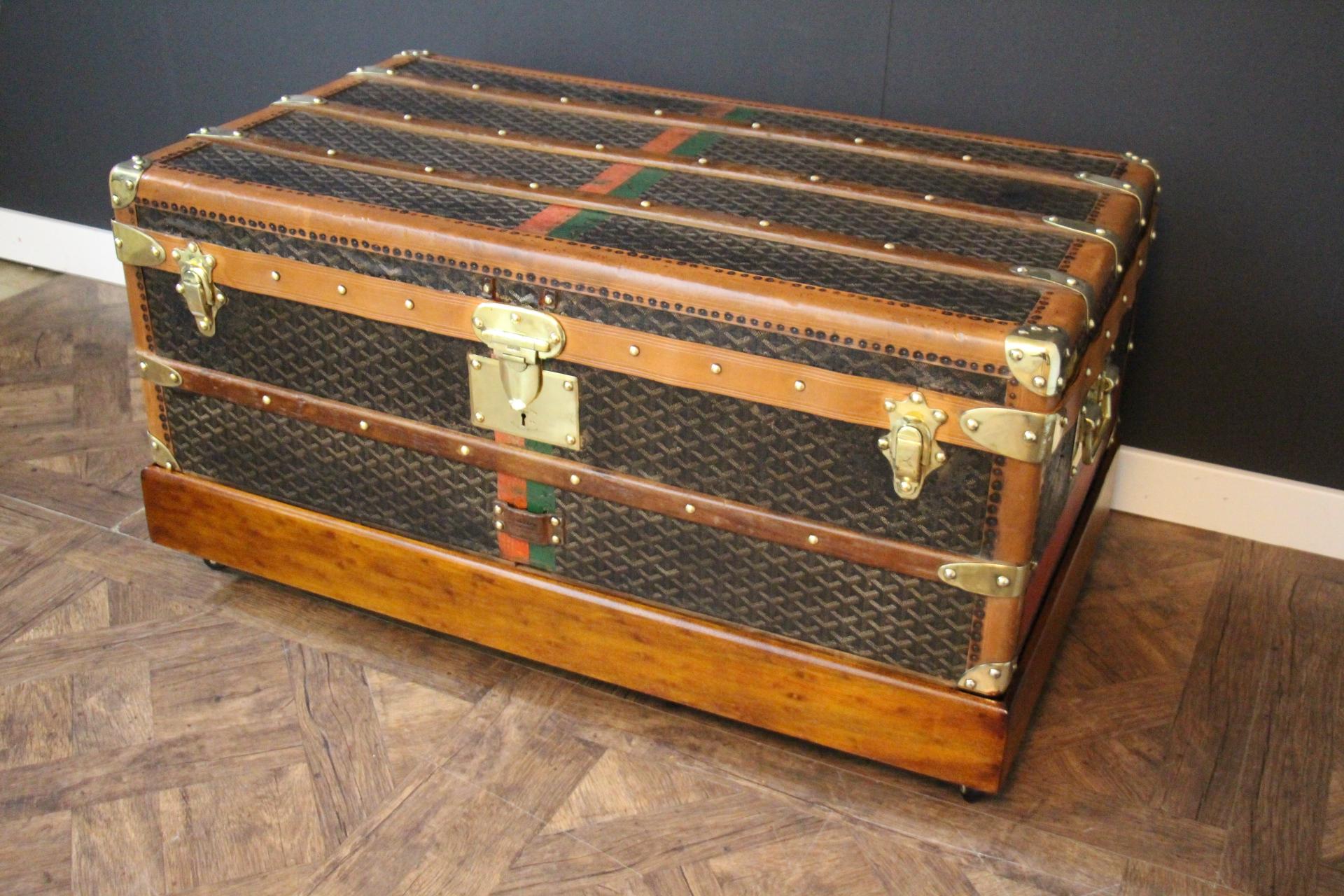 This superb Goyard steamer trunk features the very sought after chevrons canvas as well as all solid brass fittings: Goyard marked side handles and locks. Brass studs. This trunk has many wood slats as well as all toffee color  lozine trims. It is