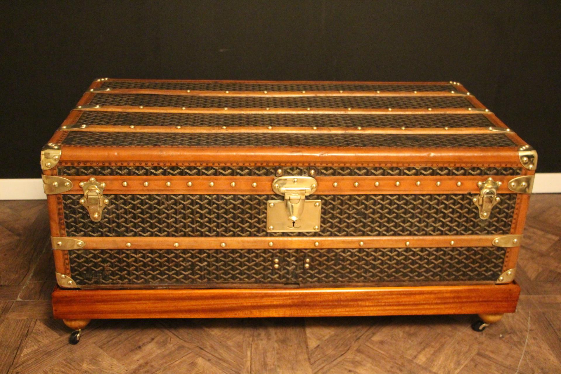 This Goyard steamer trunk features the very sought after chevrons canvas as well as all solid brass fittings: Goyard marked side handles and locks. Brass studs. This trunk has many wood slats as well as all large honey color trims.It is beautiful