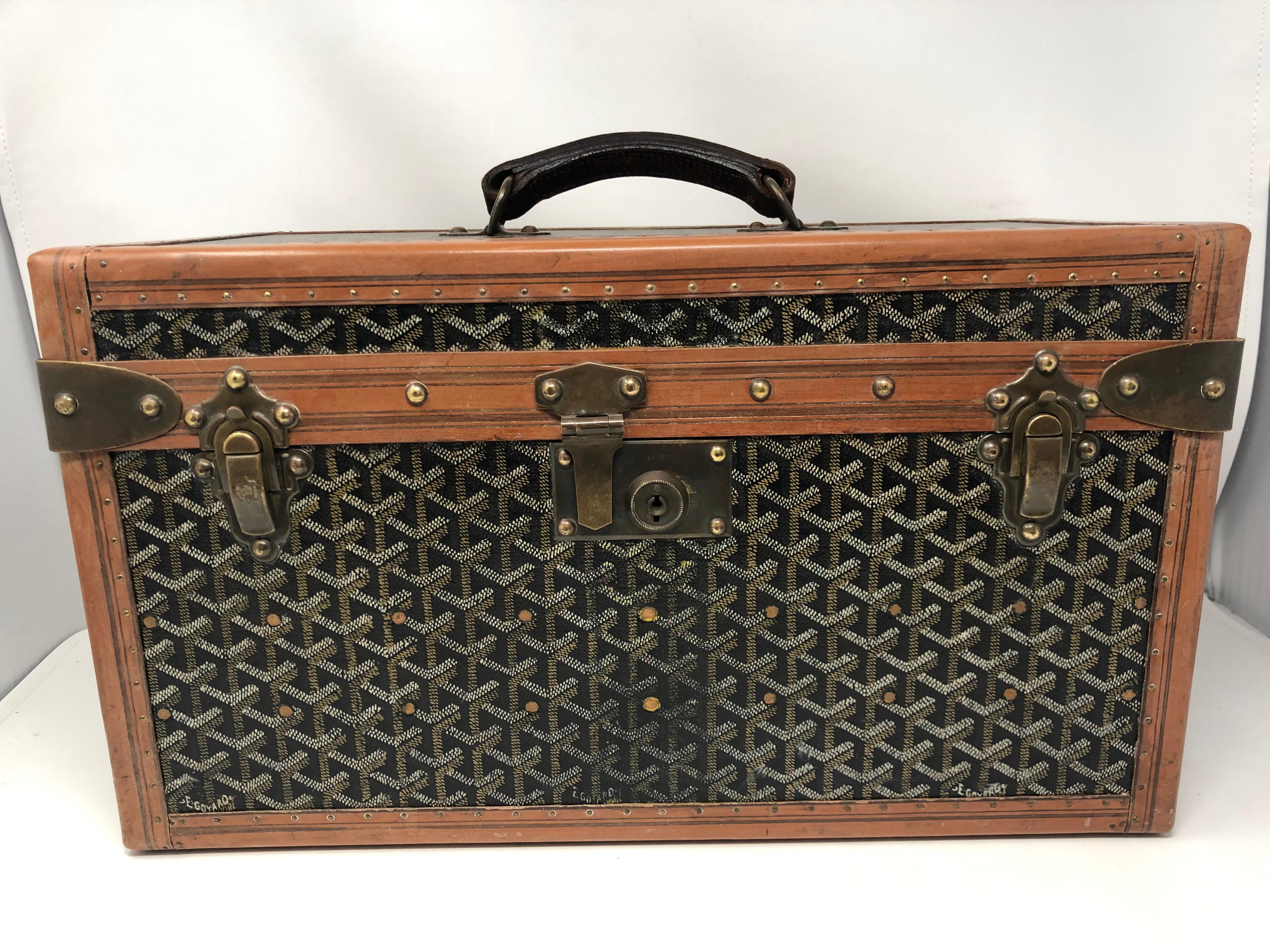 1920's Goyard Vanity Trunk Hard Case. Travel size luggage piece from Goyard. Original and well maintained for its age. A true collector's piece. Inside is clean. Beautiful piece that could work well with home decor as well as a travel companion.