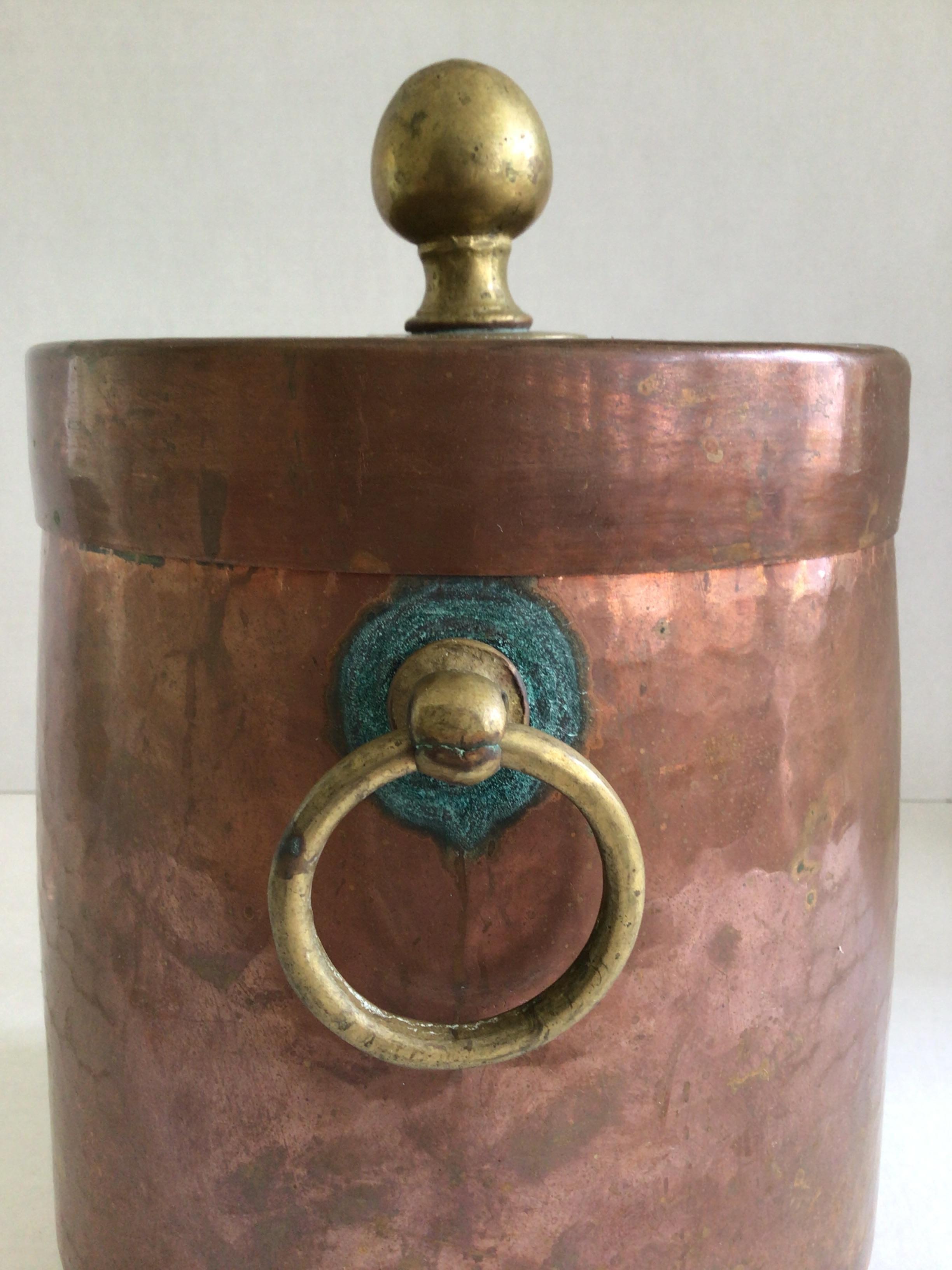 Cast 1920s Hammered Copper Ice Bucket with Brass Feet, Handles, and Knob For Sale