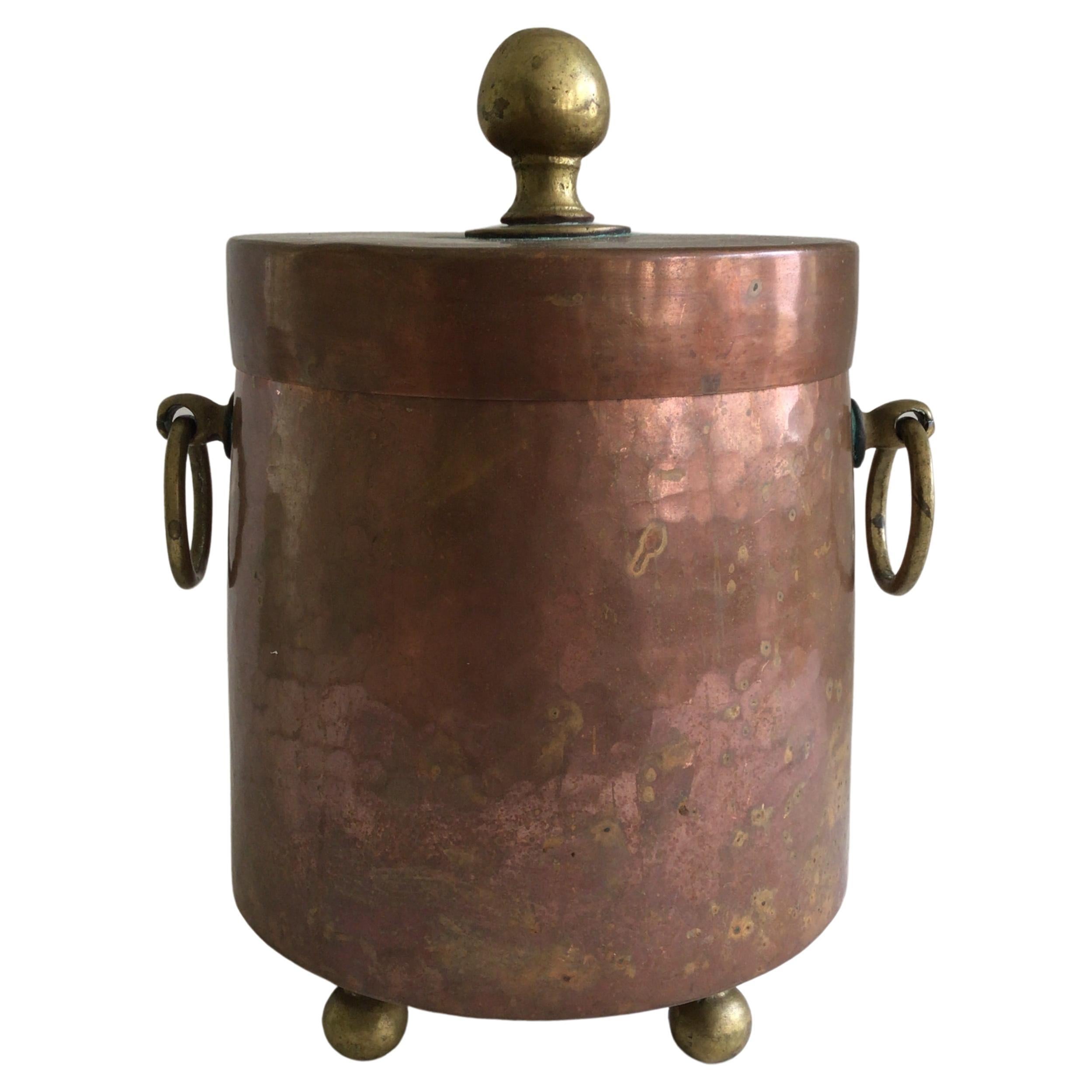 1920s Hammered Copper Ice Bucket with Brass Feet, Handles, and Knob For Sale