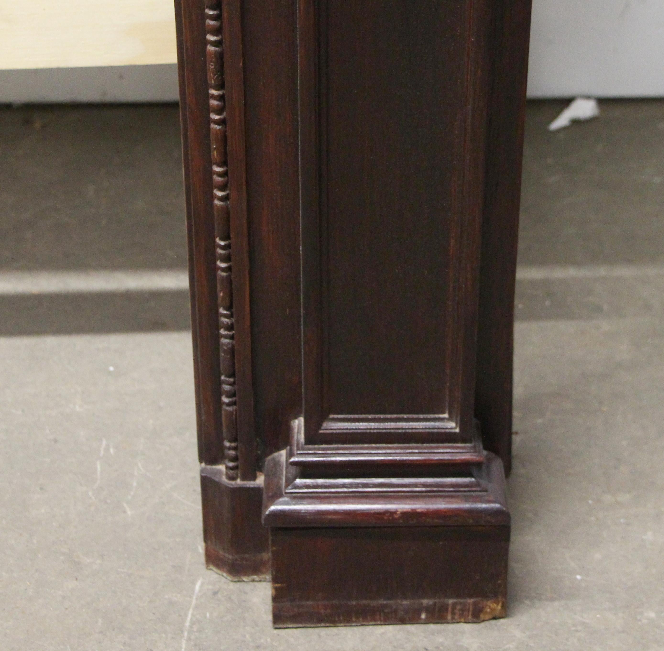 Early 20th Century 1920s Hand Carved Wood Federal Style Mantel with a Dark Mahogany Finish