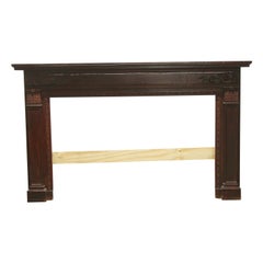 1920s Hand Carved Wood Federal Style Mantel with a Dark Mahogany Finish