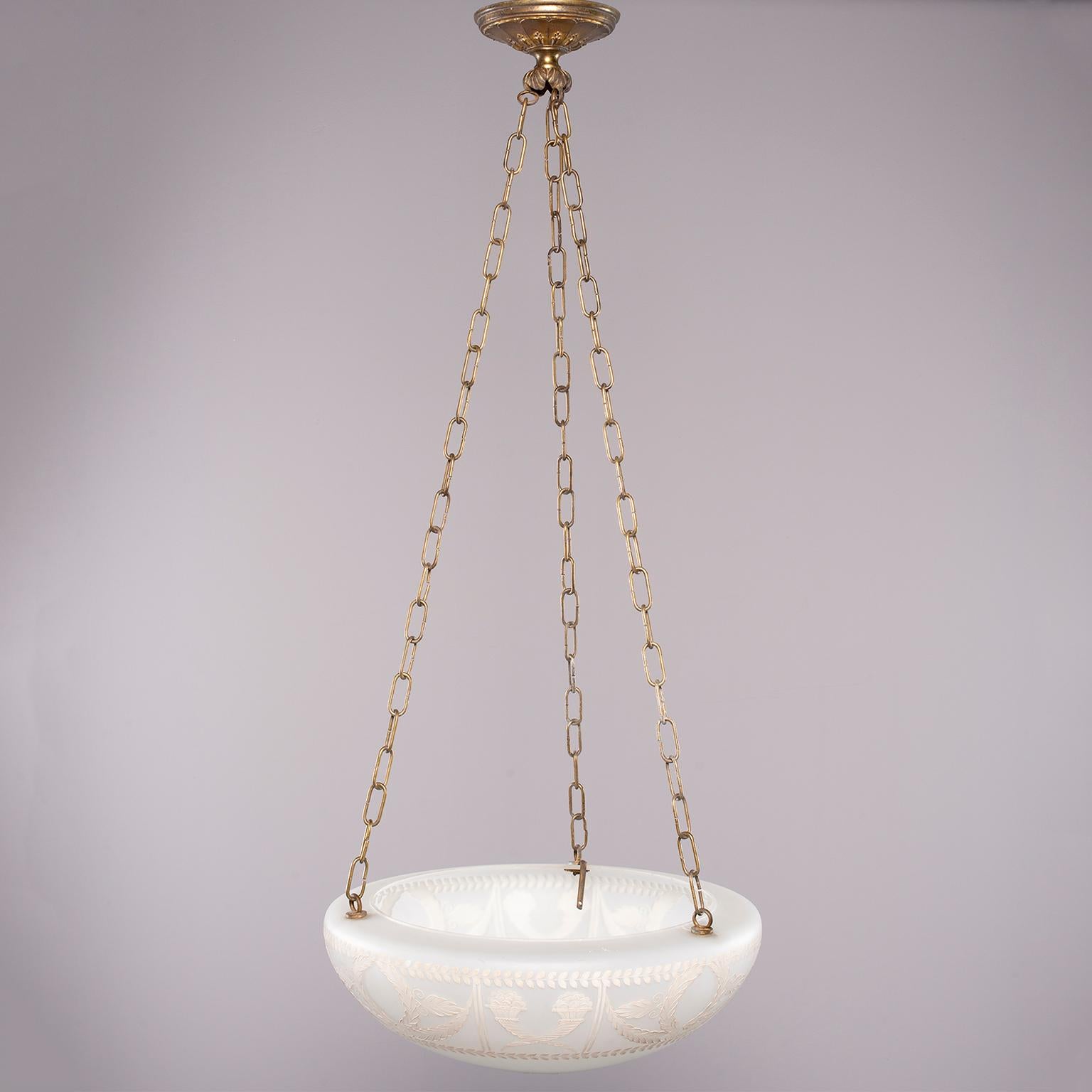 French white opaline glass fixture with hand painted design of garlands and wreaths was previously used in Paris Dior boutique, circa 1920s. Height shown is for the glass globe only - chain length is adjustable. Three interior standard sockets have