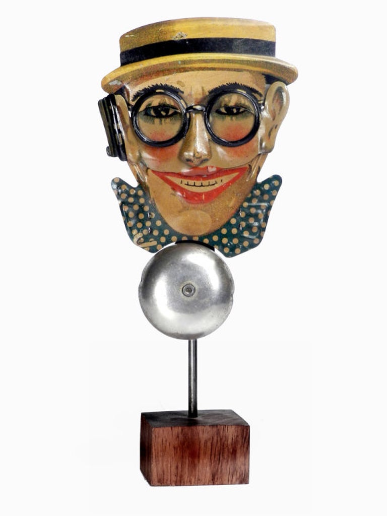This rare pre- WW II German made tin toy is seldom seen.

Lloyd, Harold (Clayton) (1893–1971), U.S. movie comedian. Performing his own hair-raising stunts, he used physical danger as a source of comedy in silent movies such as High and Dizzy