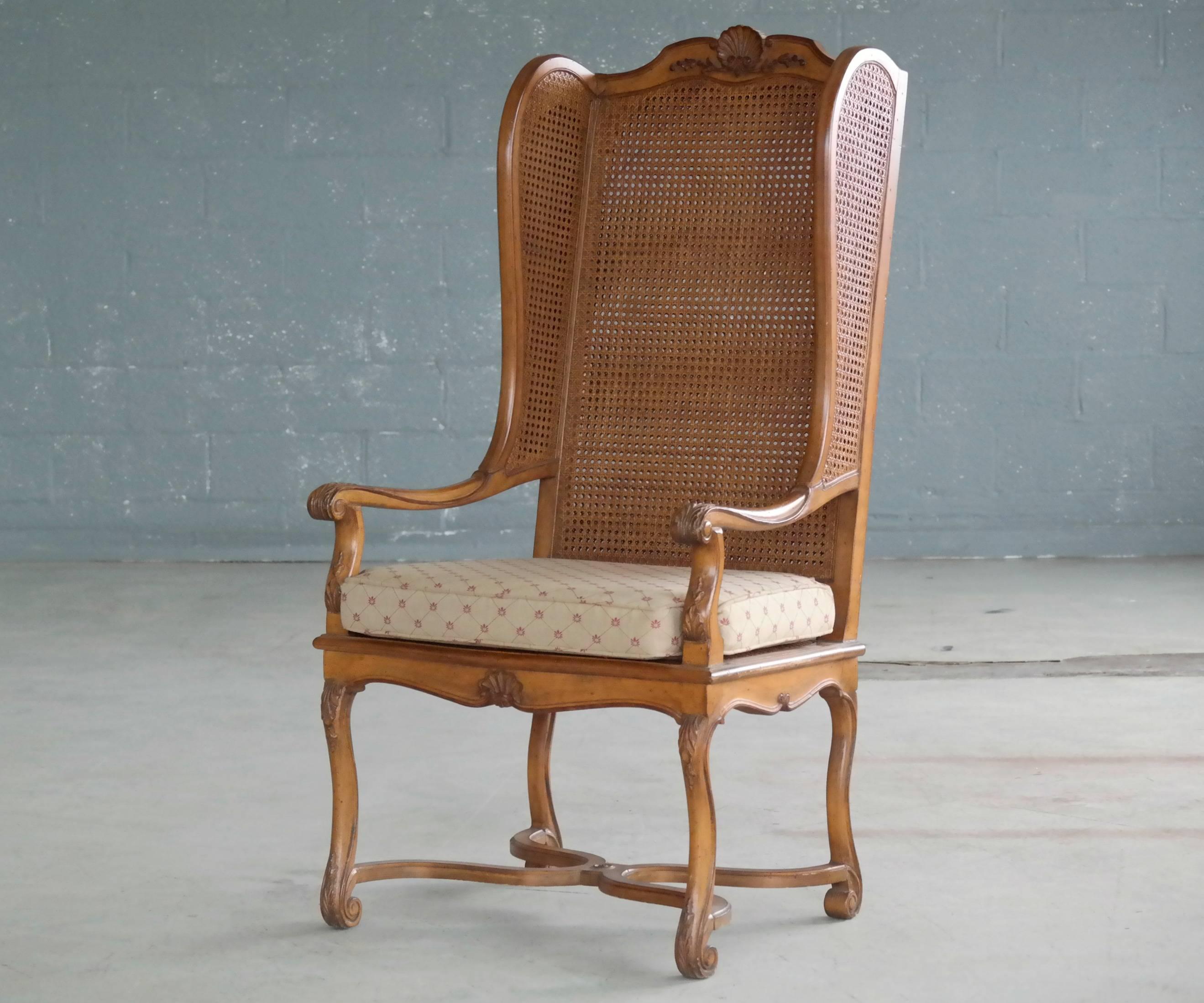 1920s Hollywood Regency Cane Wingback Chair In Excellent Condition In Bridgeport, CT
