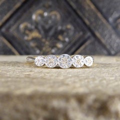 1920s Illusion Set Diamond Five Stone Ring in 18 Carat Yellow Gold and Platinum