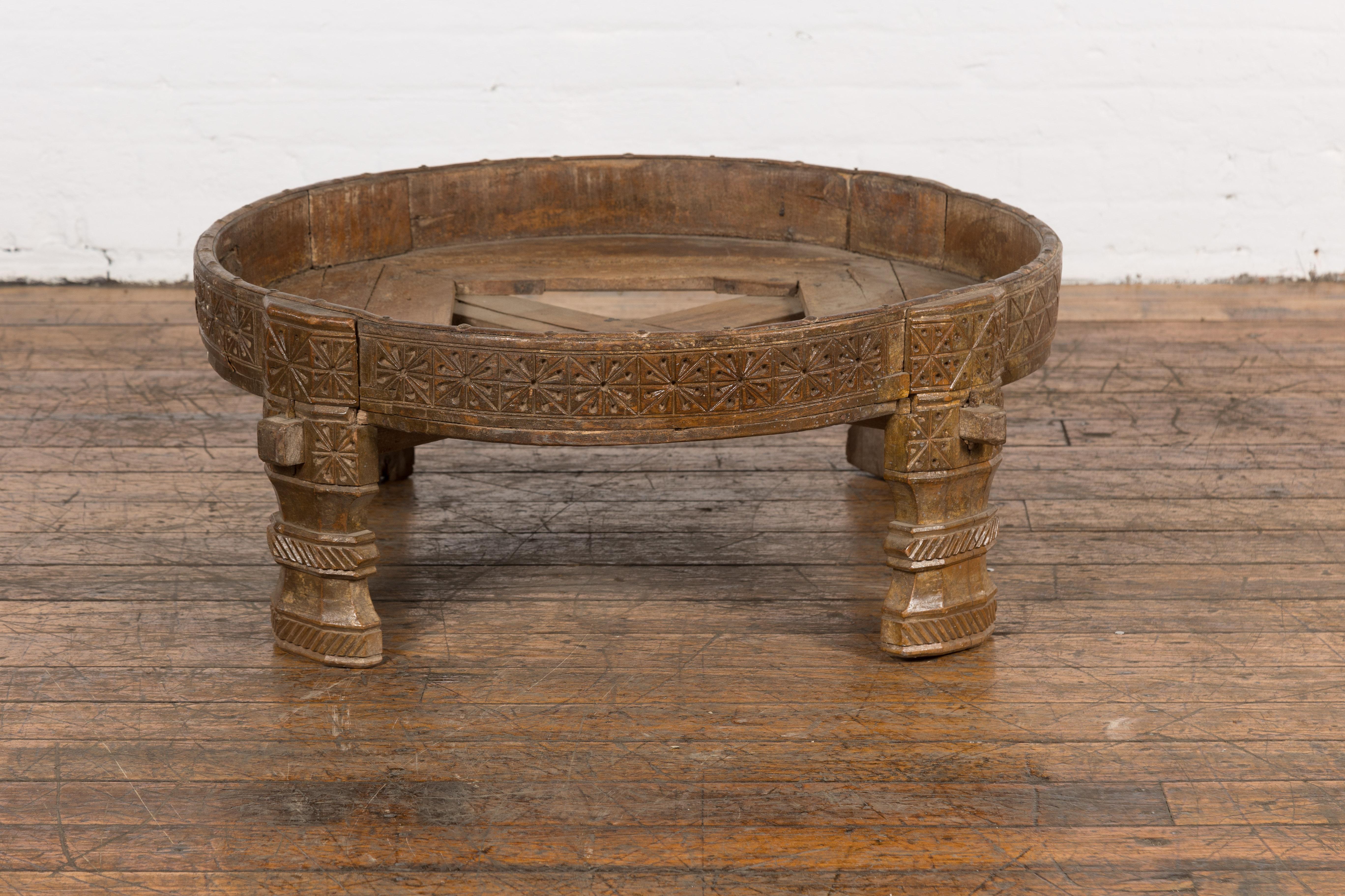 1920s Indian Antique Chakki Grinding Table with Hand-Carved Geometric Décor For Sale 3