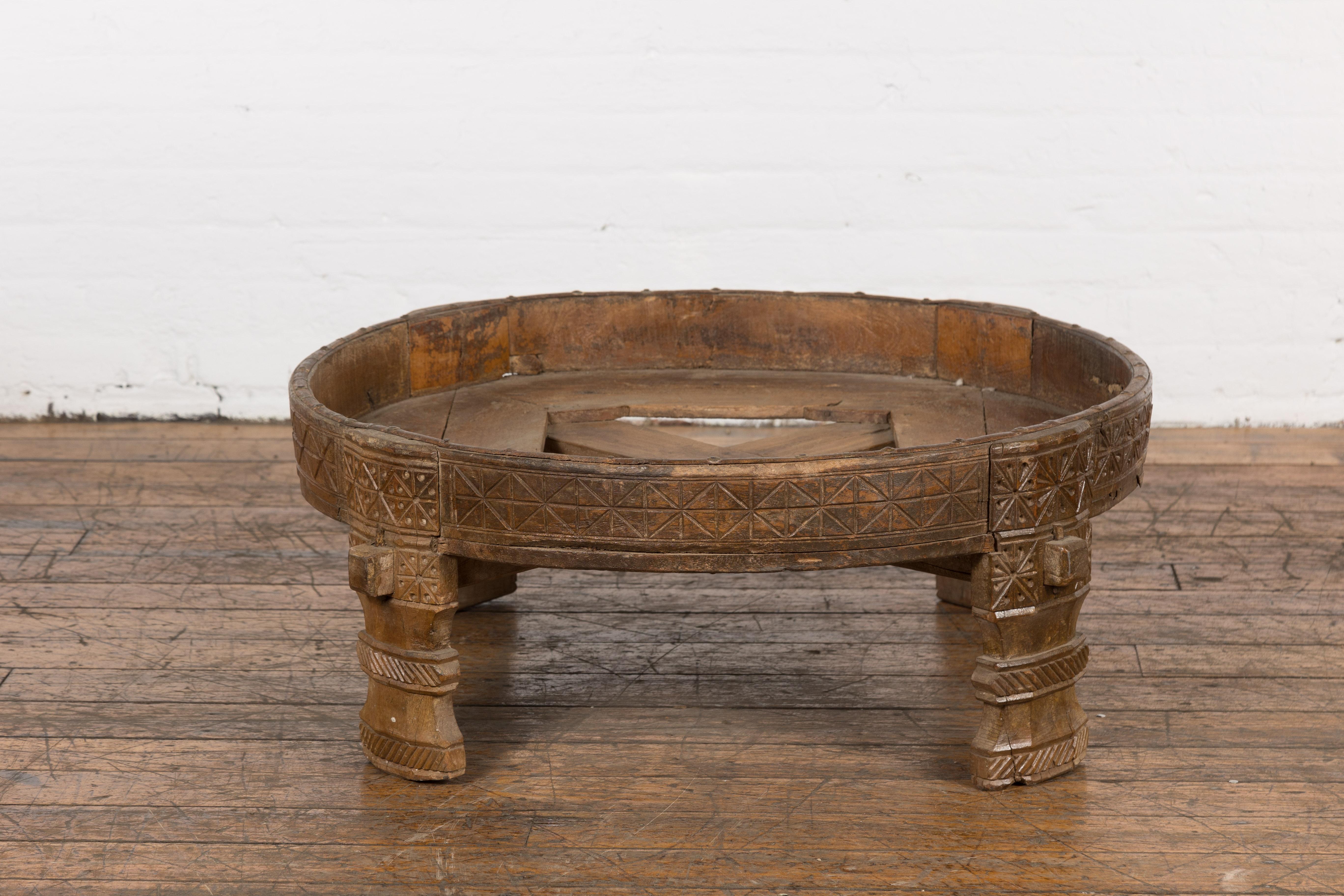 1920s Indian Antique Chakki Grinding Table with Hand-Carved Geometric Décor For Sale 5