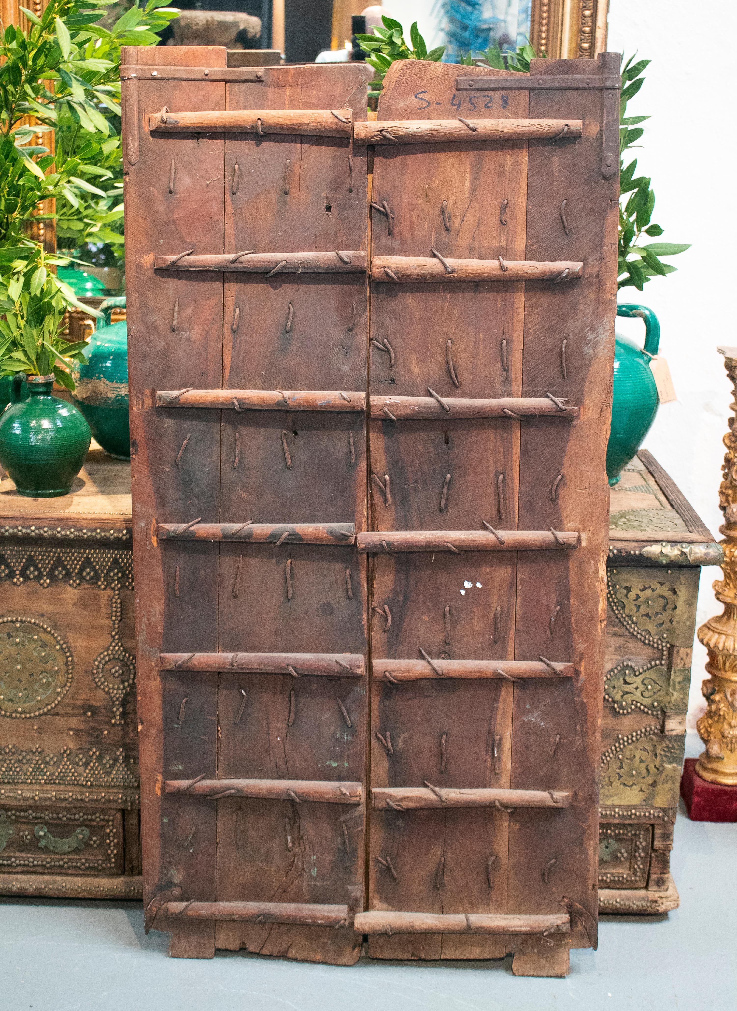 1920s Indian Wooden Door Profusely Decorated with Ornamental Bronze and Iron 7