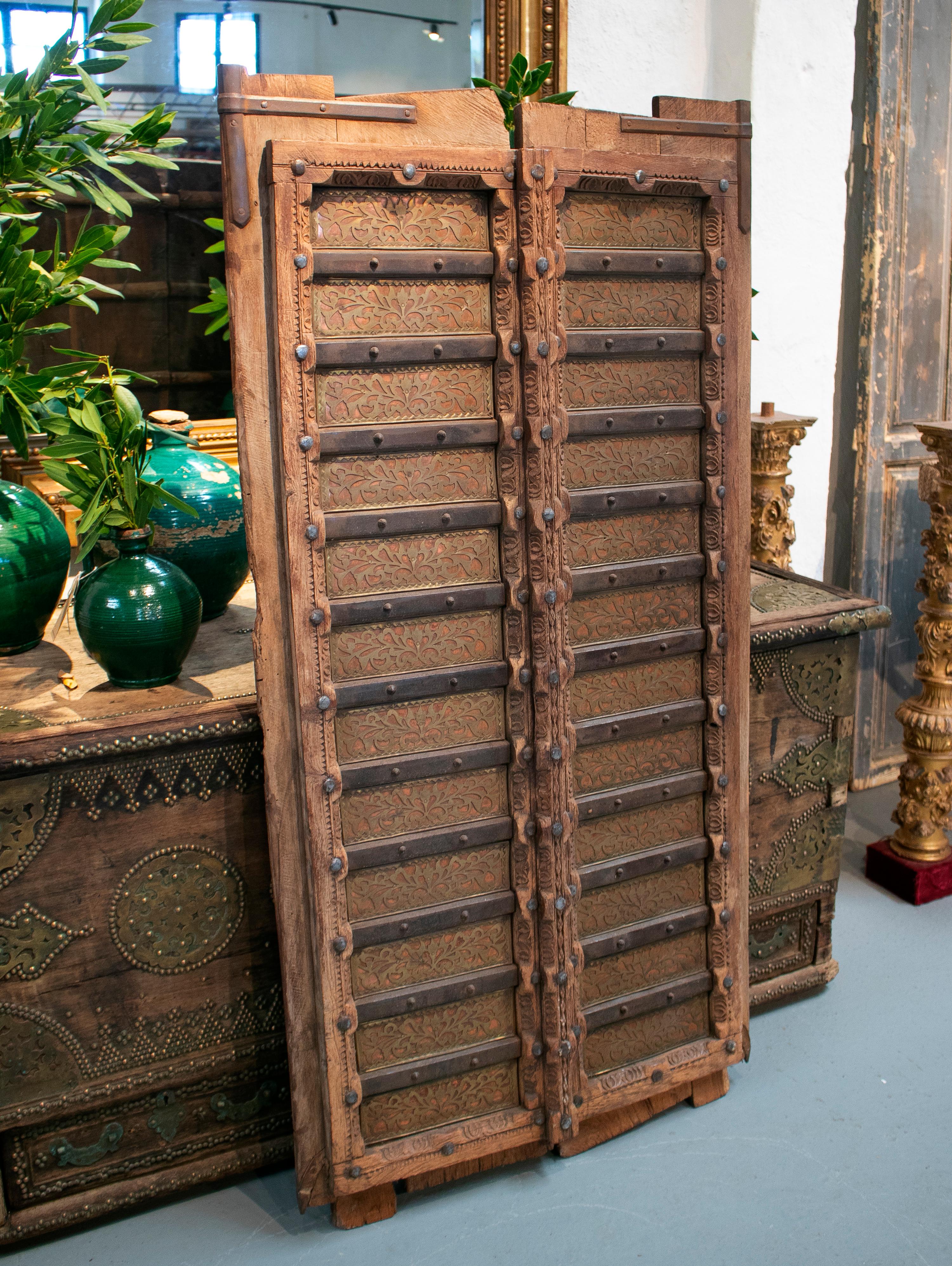 1920s Indian Wooden Door Profusely Decorated with Ornamental Bronze and Iron 13
