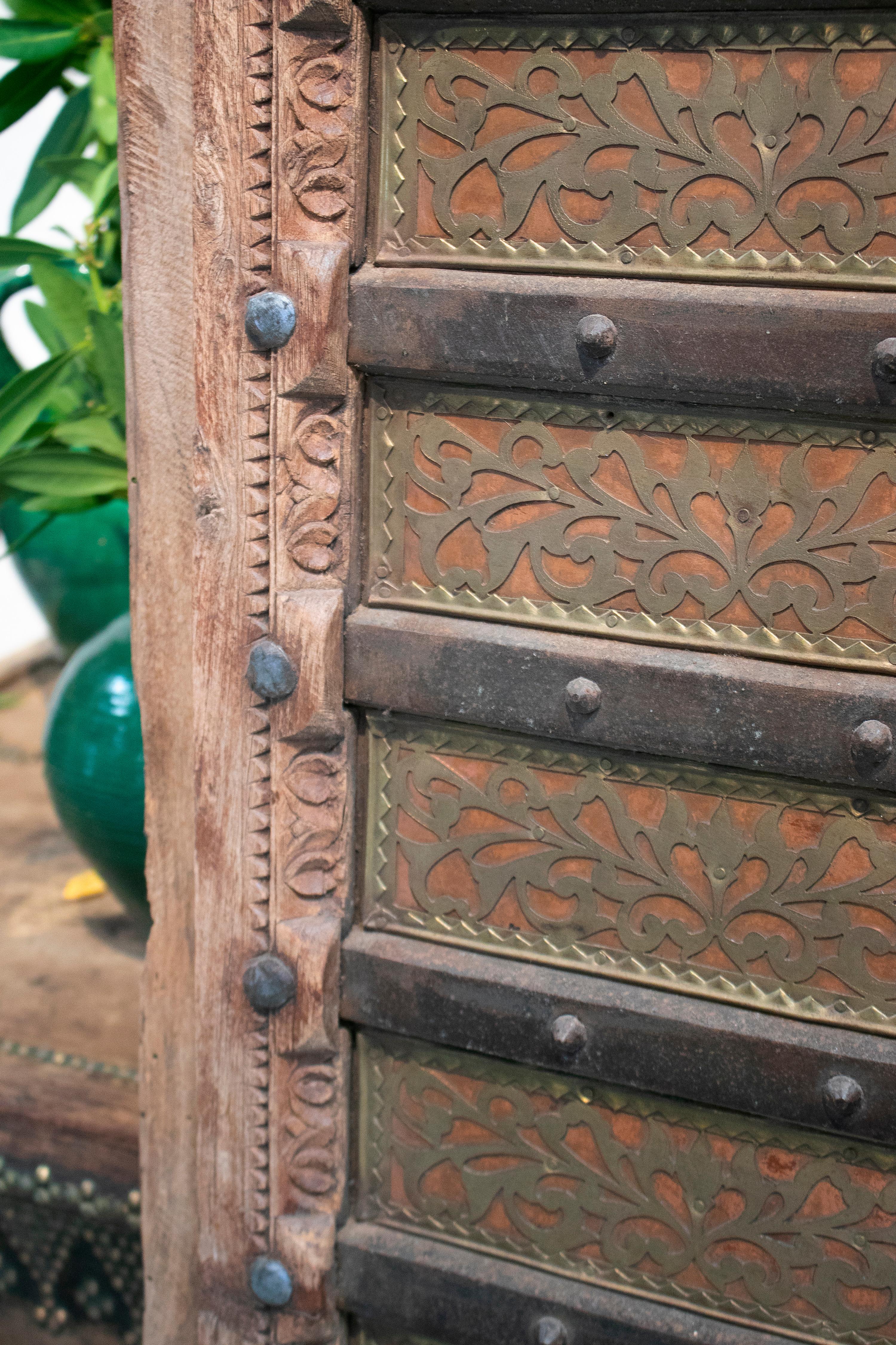 20th Century 1920s Indian Wooden Door Profusely Decorated with Ornamental Bronze and Iron