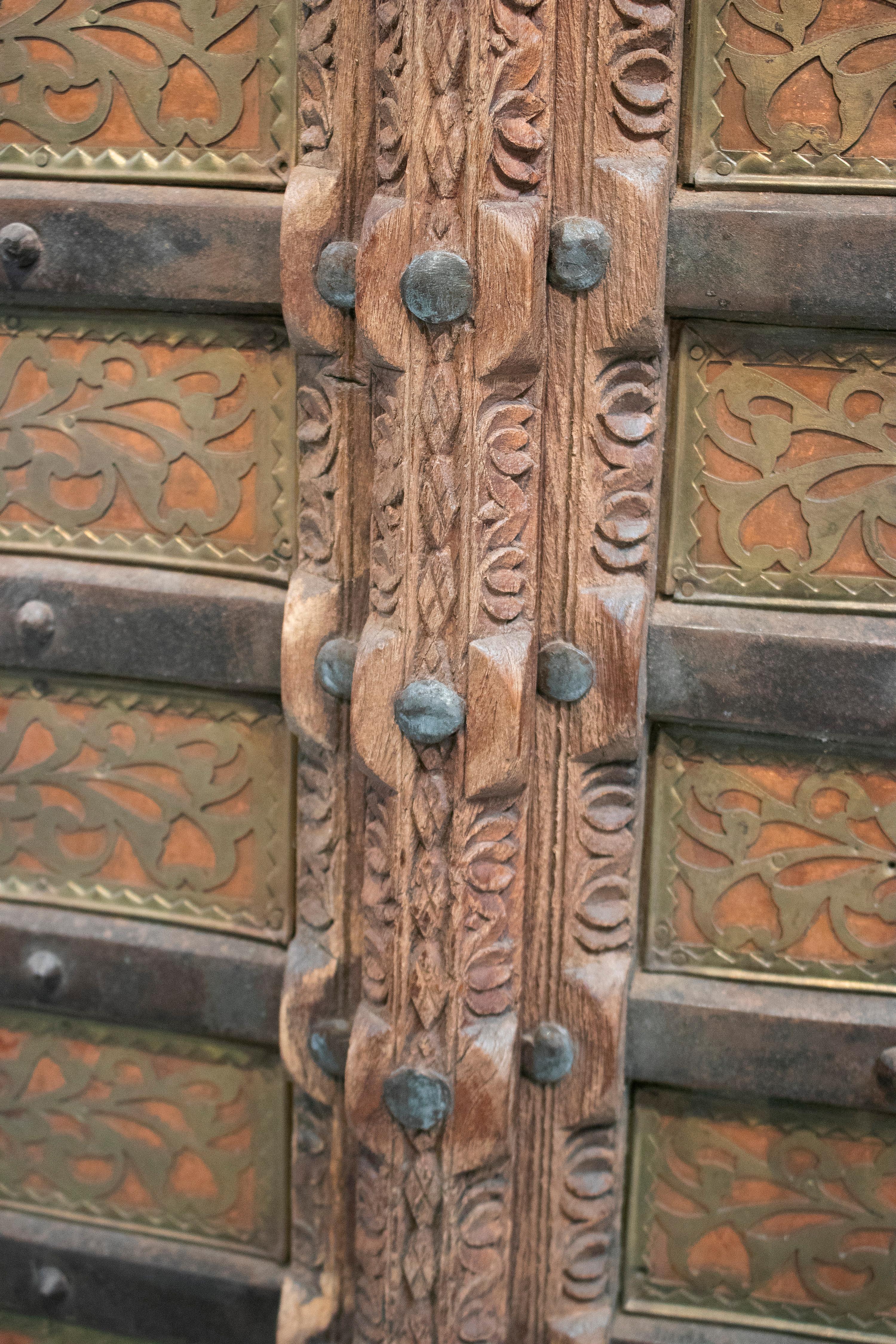 1920s Indian Wooden Door Profusely Decorated with Ornamental Bronze and Iron 4