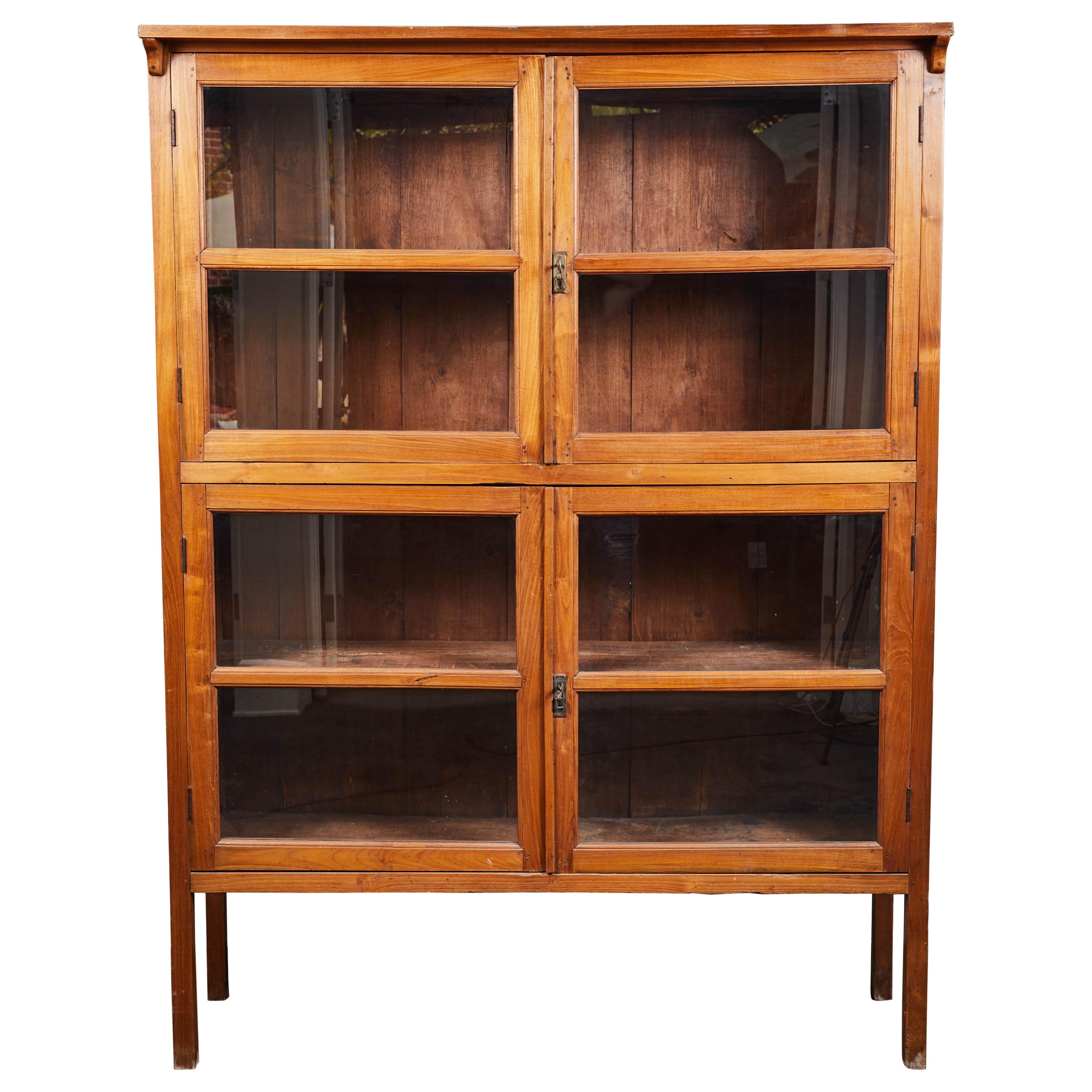 1920s Indonesian Teak 4-Door Glass Panel Cabinet