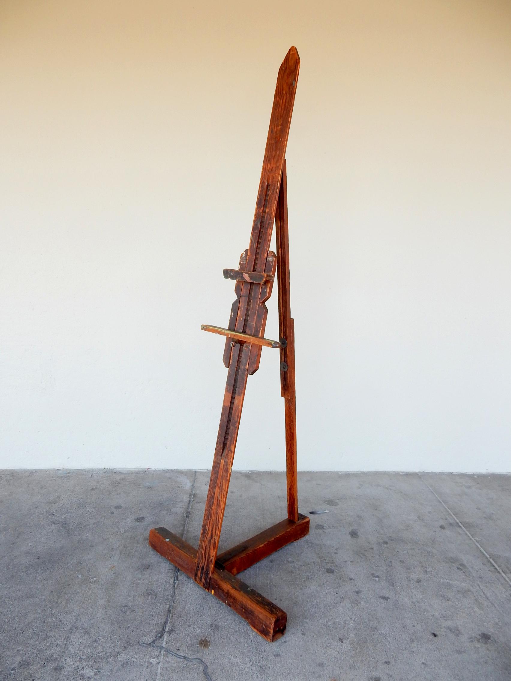 Antique Erwin Riebe of New York City large artist’s studio floor easel,
1920s or early 1930s. Pine and iron construction.
It has amazing patina and paint splatter.
Completely original with no repairs. Well used and worn.
Makes a great art