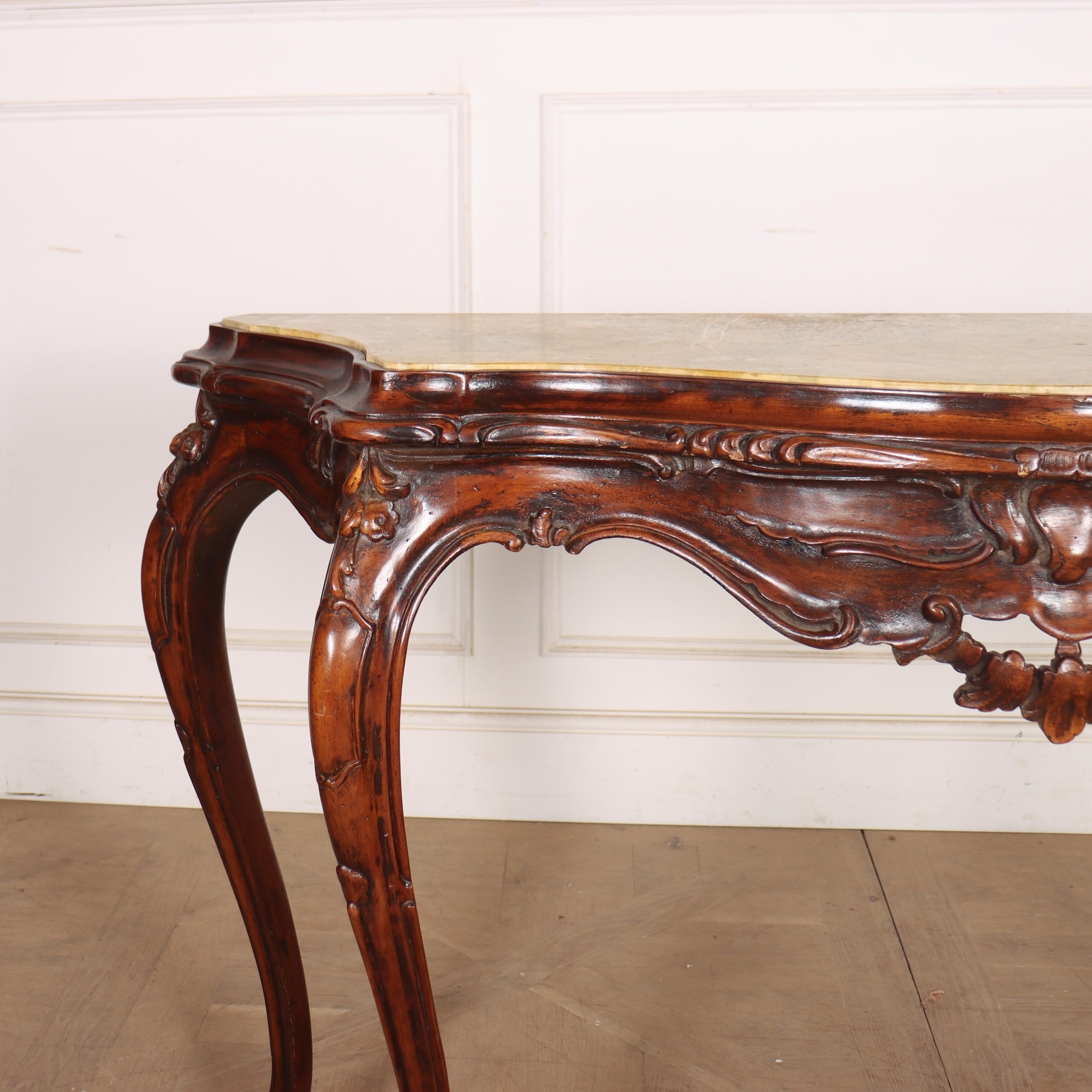 1920's Italian serpentine console table in carved walnut with a shaped marble top. 1920.

Width & depth of marble: 51-inches x 16-inches


Code: 8917

Dimensions:
W: 58