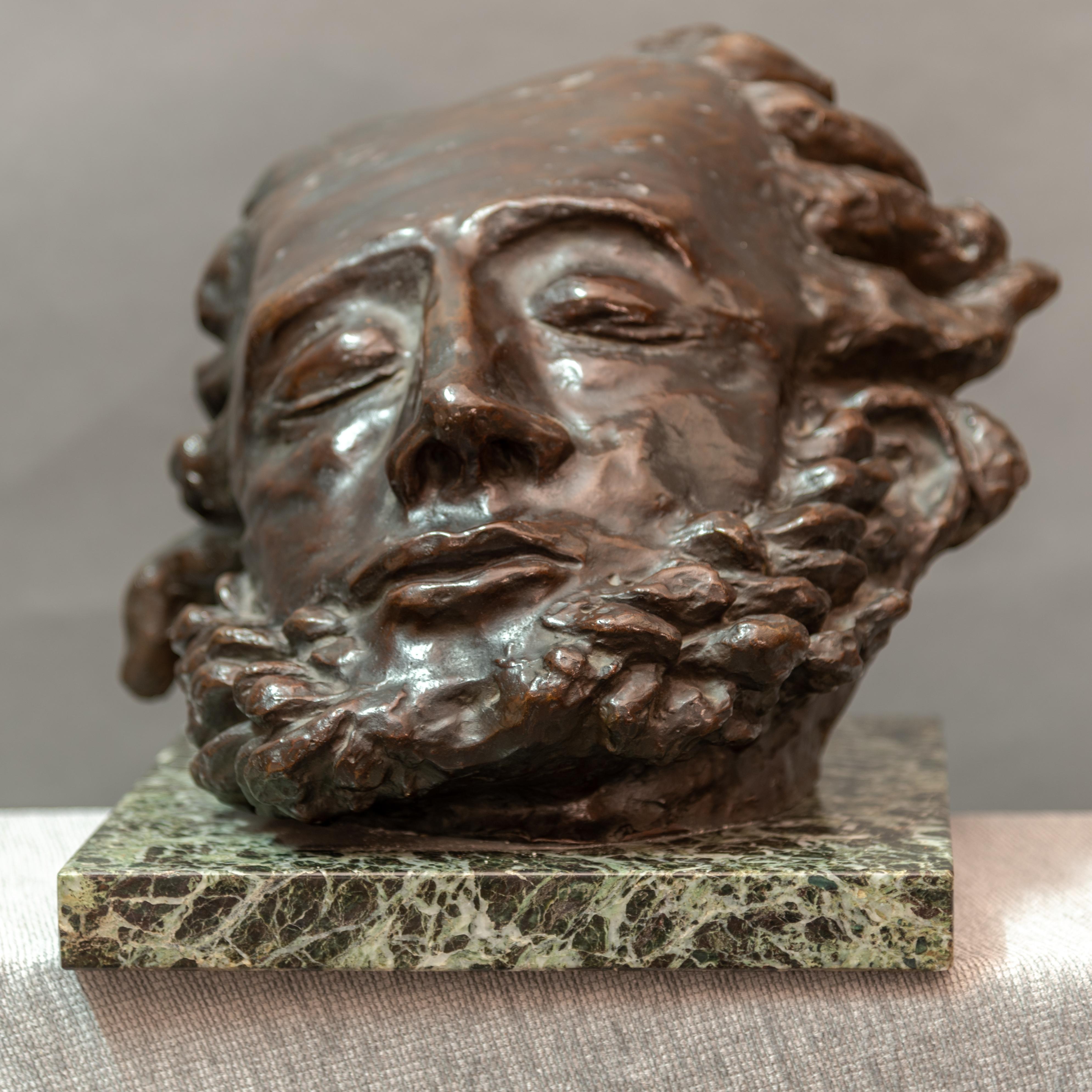 Bronze on a marble base It bears Mayo's signature. 
 Trademark Fondart - Lagana Napoli.
“Of the first sculpture, a group of highly vigorous original artistry, all that remains is Adam's Mask “
This phrase is from a very rare 1929 pamphlet L'Abruzzo