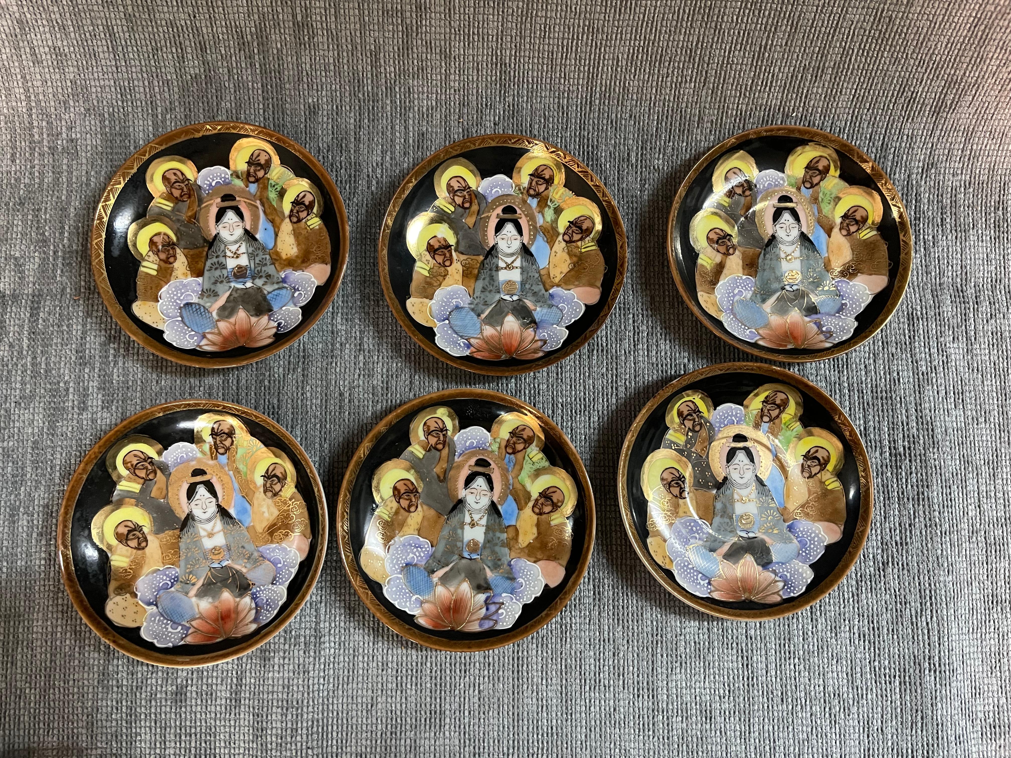 1920s Japanese Hand Painted and Gilded Demitasse Coffee Service 
This exceptional 1920s Japanese coffee service features 6 demitasse cups with accompanying, coffee pot, sugar bowl and creamer. 
There are wonderful motifs on the porcelain which are