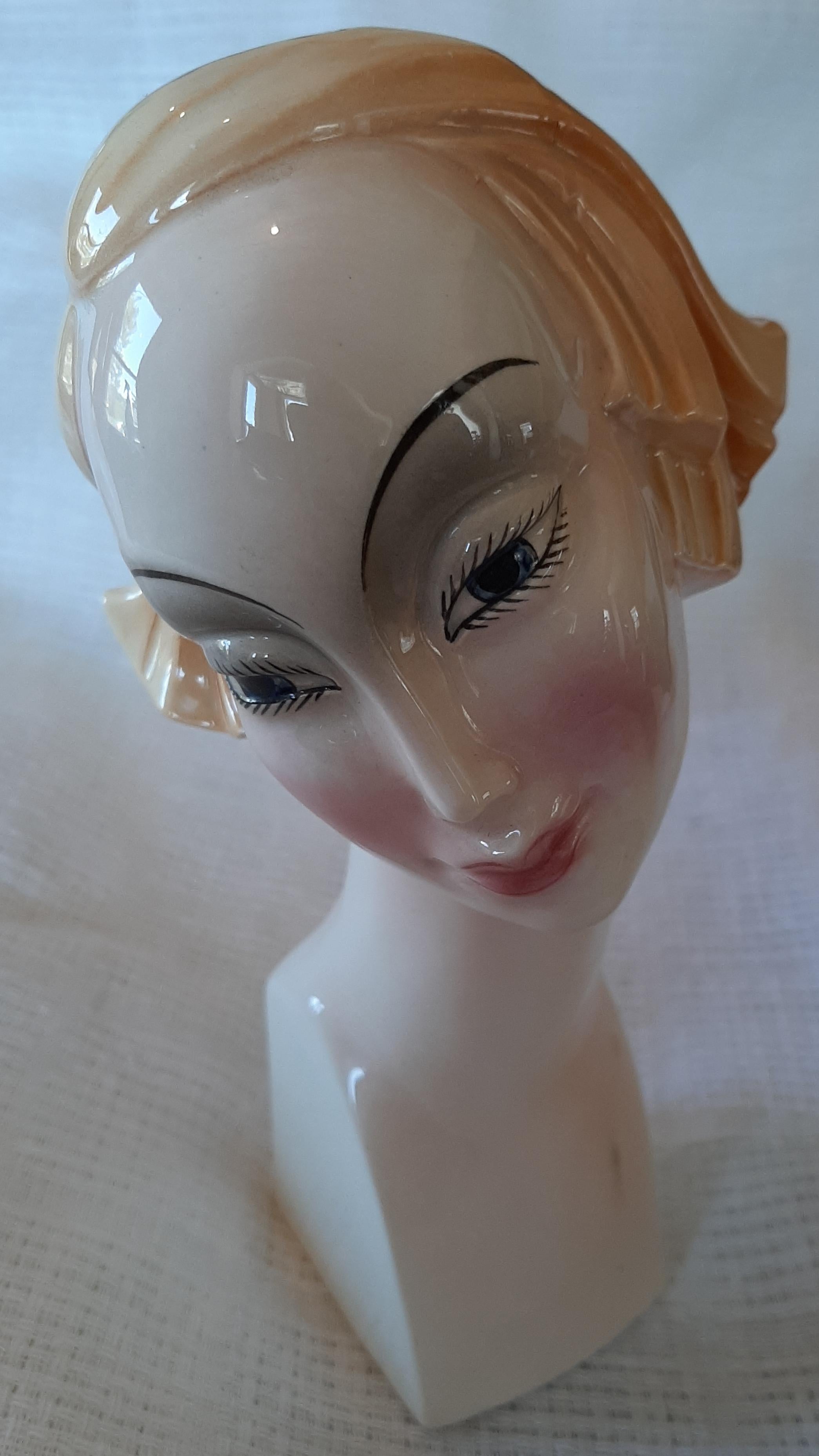 Circa. 1920s  Katzhutte Hertwig & Co. Art Deco porcelain flapper girl bust / head is a rare and unusual and collectible piece! Stands 8