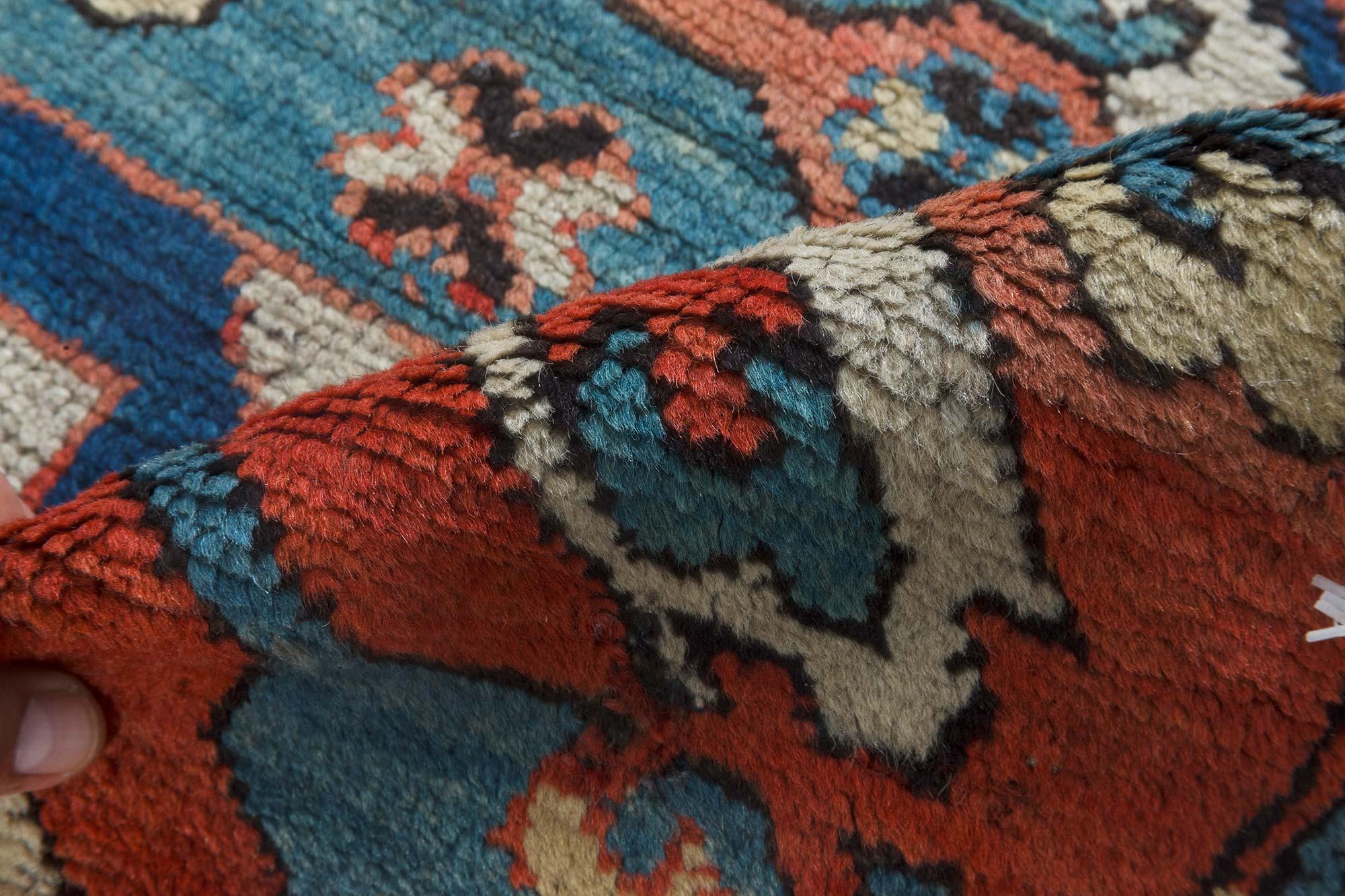 1920s Kazak blue, red and white handmade wool rug
Size: 3'10
