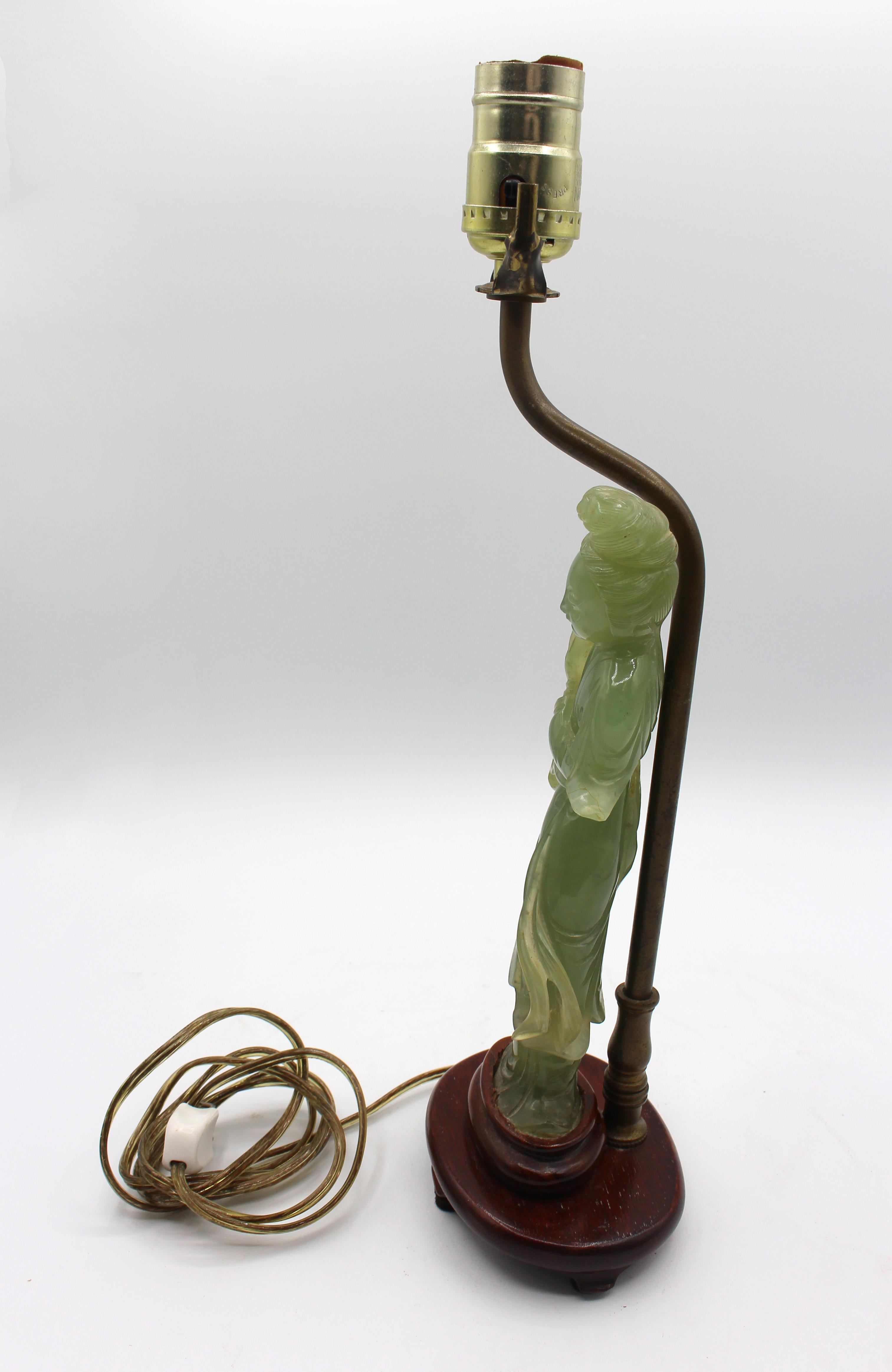 Late 19th century celadon quartz Guan Yin figure, made into a lamp, Chinese. Late Qing. Lamped in the 1920s and newly electrified.
Figure: 8.25