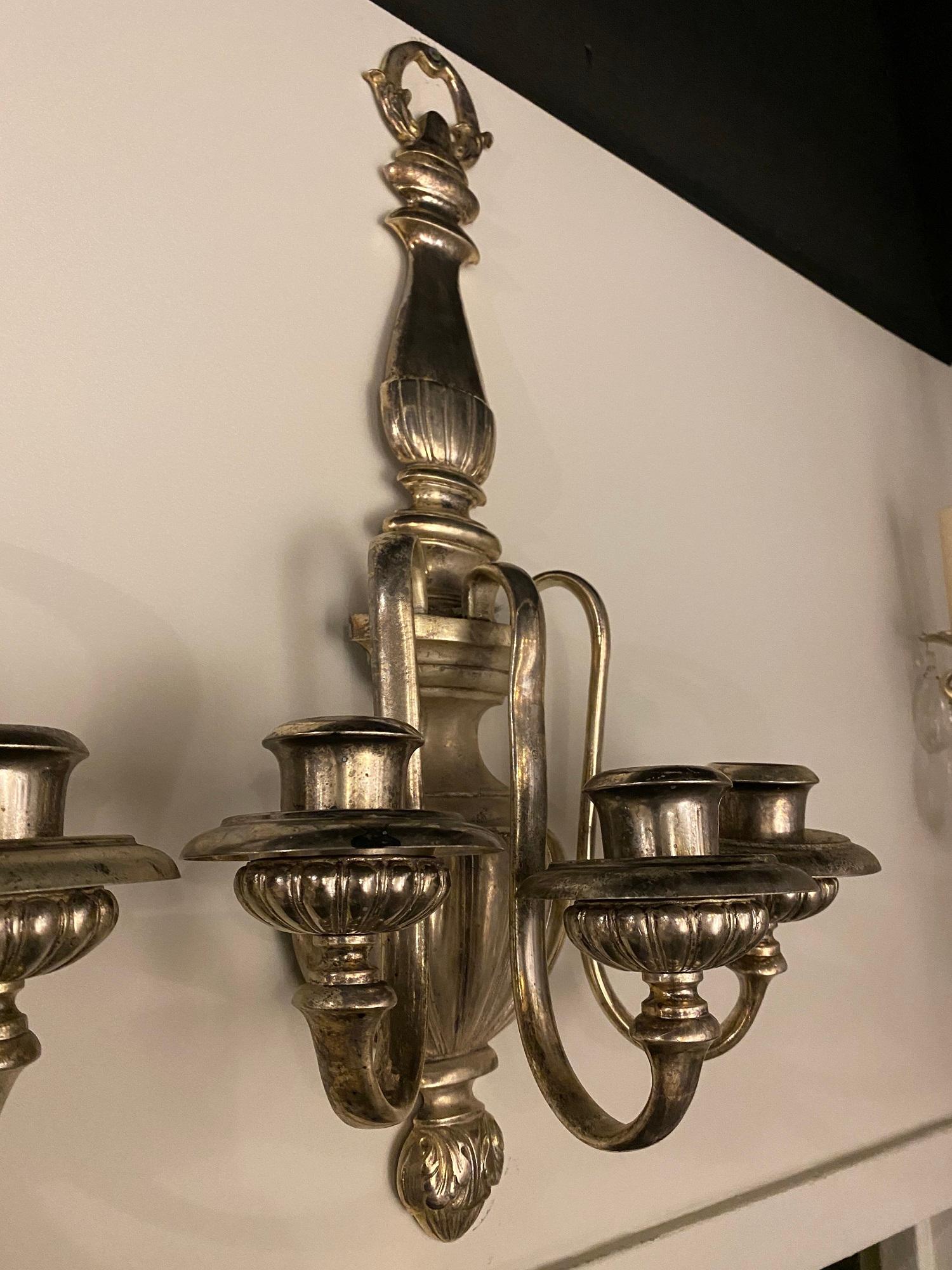 A pair of circa 1920’s large Caldwell silver plated sconces with 3 lights unusual size
